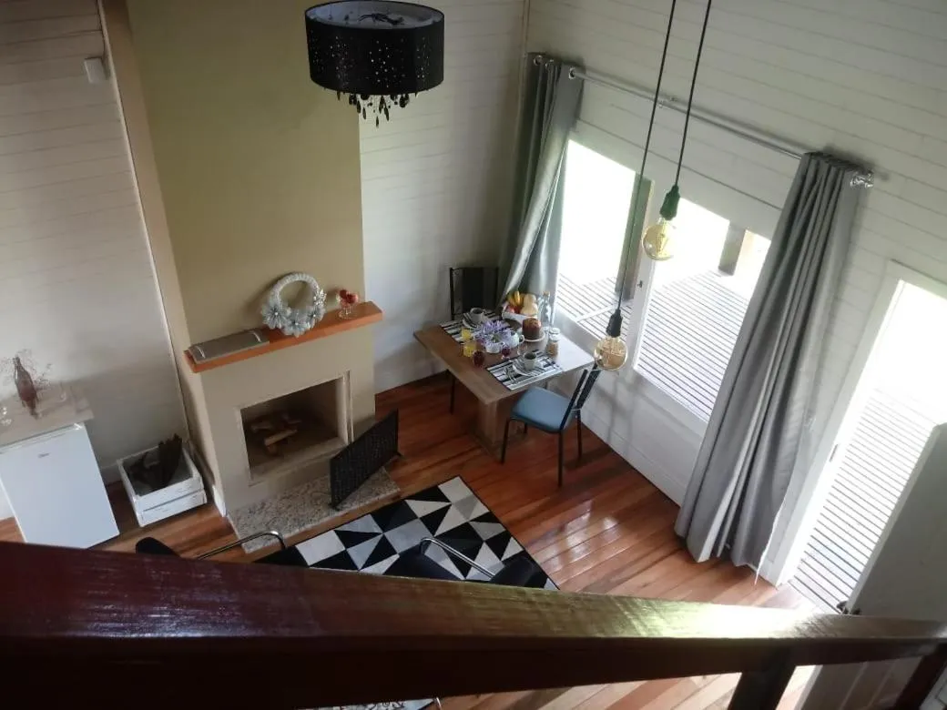 Living room in Pousada Toscana Cambará