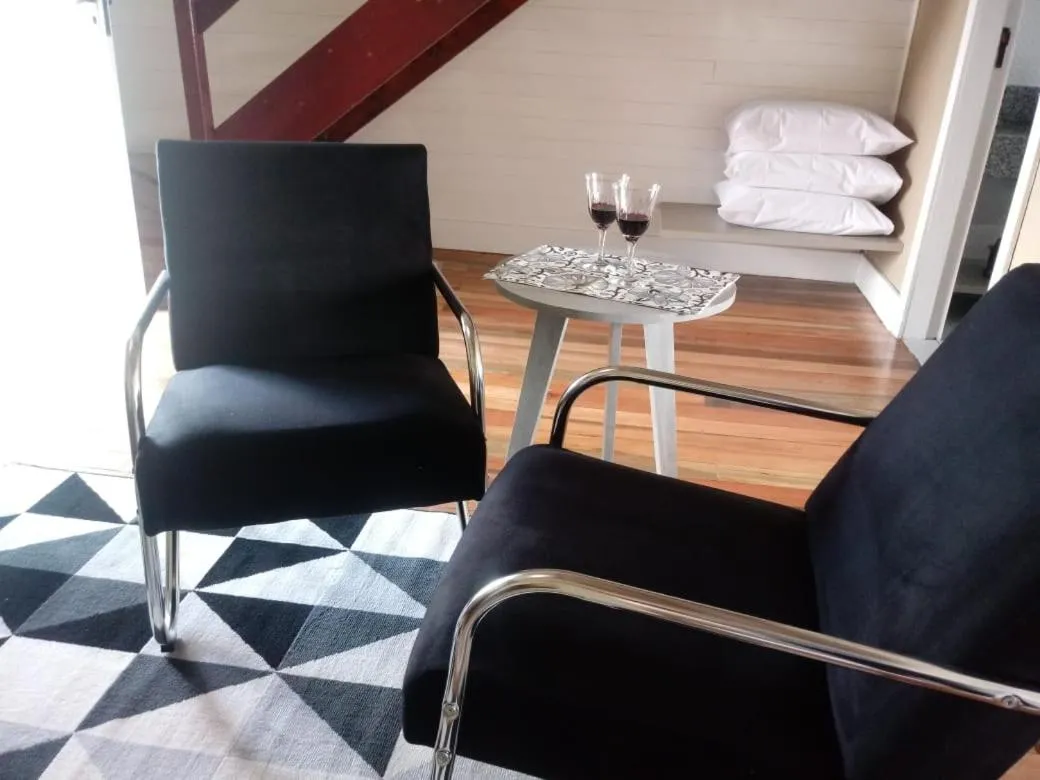 Living room in Pousada Toscana Cambará