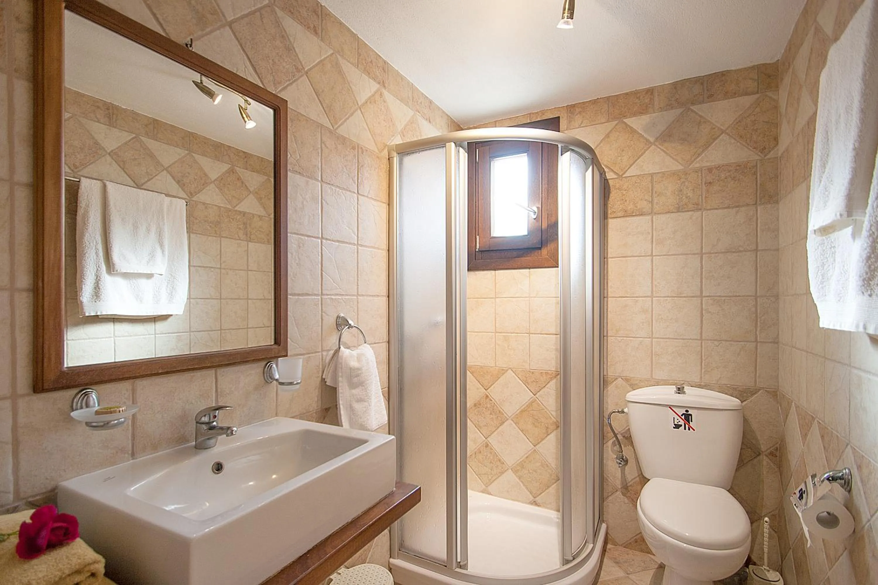 Communal lounge/ TV room in Four Seasons Villas