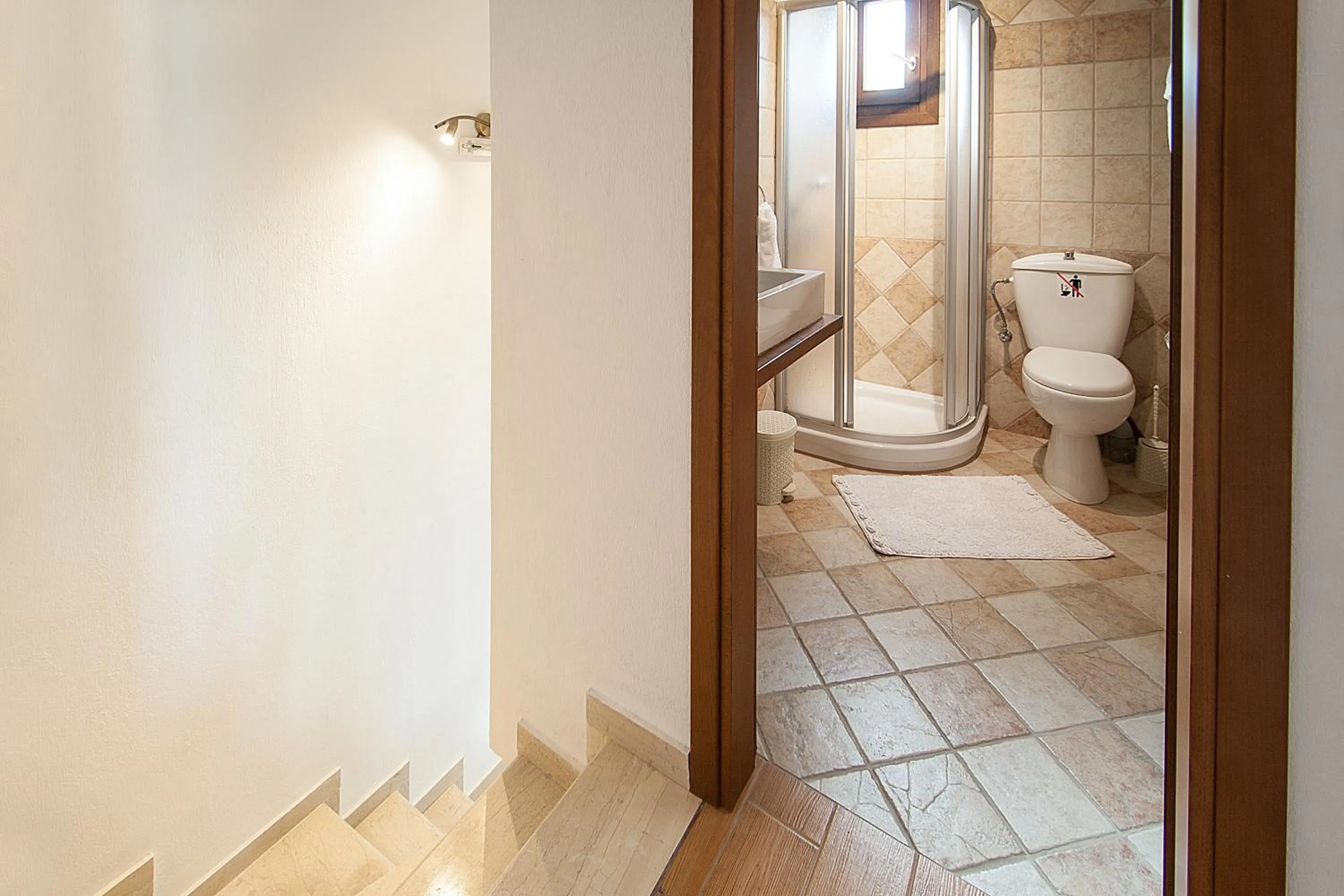 Communal lounge/ TV room in Four Seasons Villas