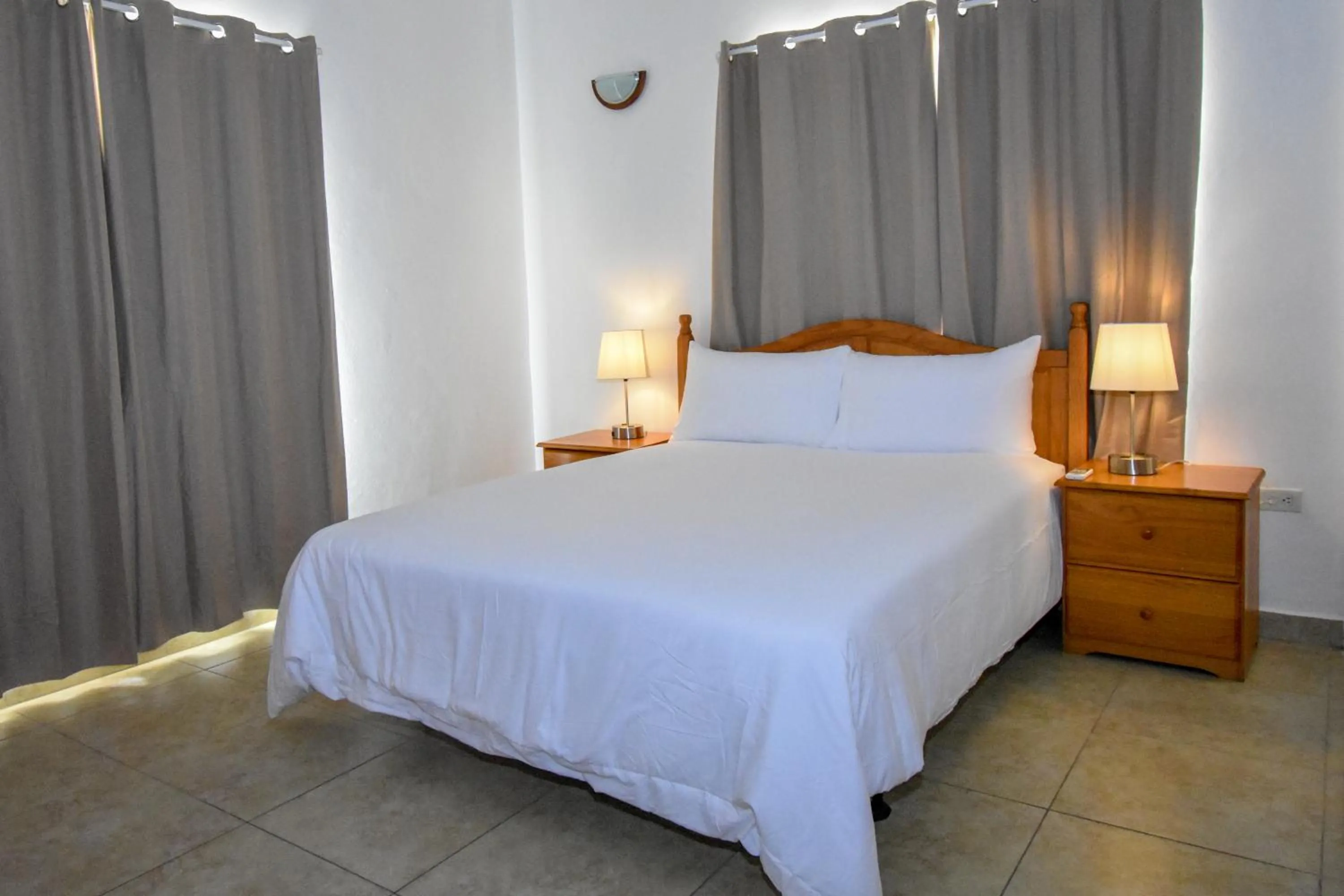 Bed in Lord Nelson Hotel & Residences