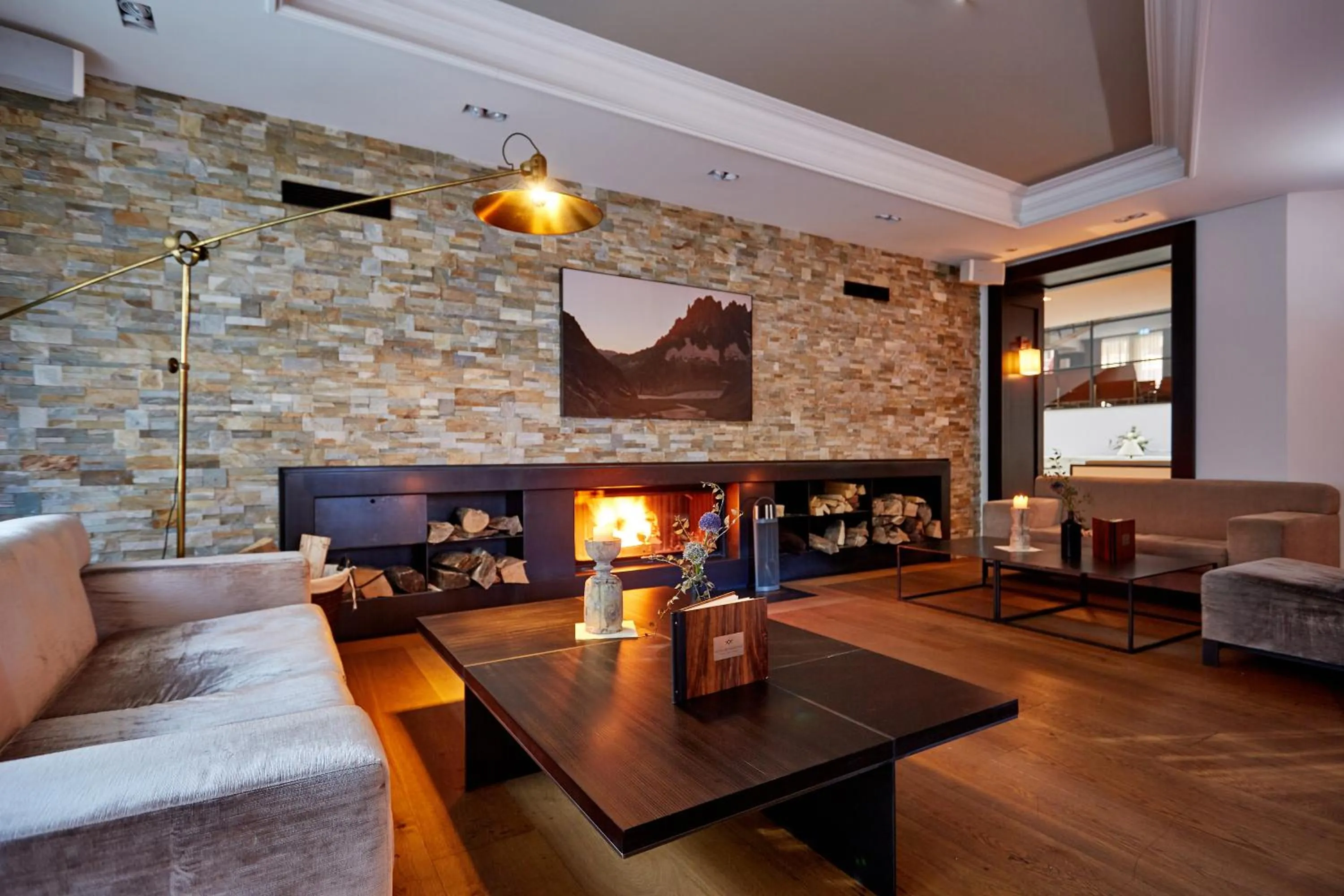 Communal lounge/ TV room in Hotel am Badersee