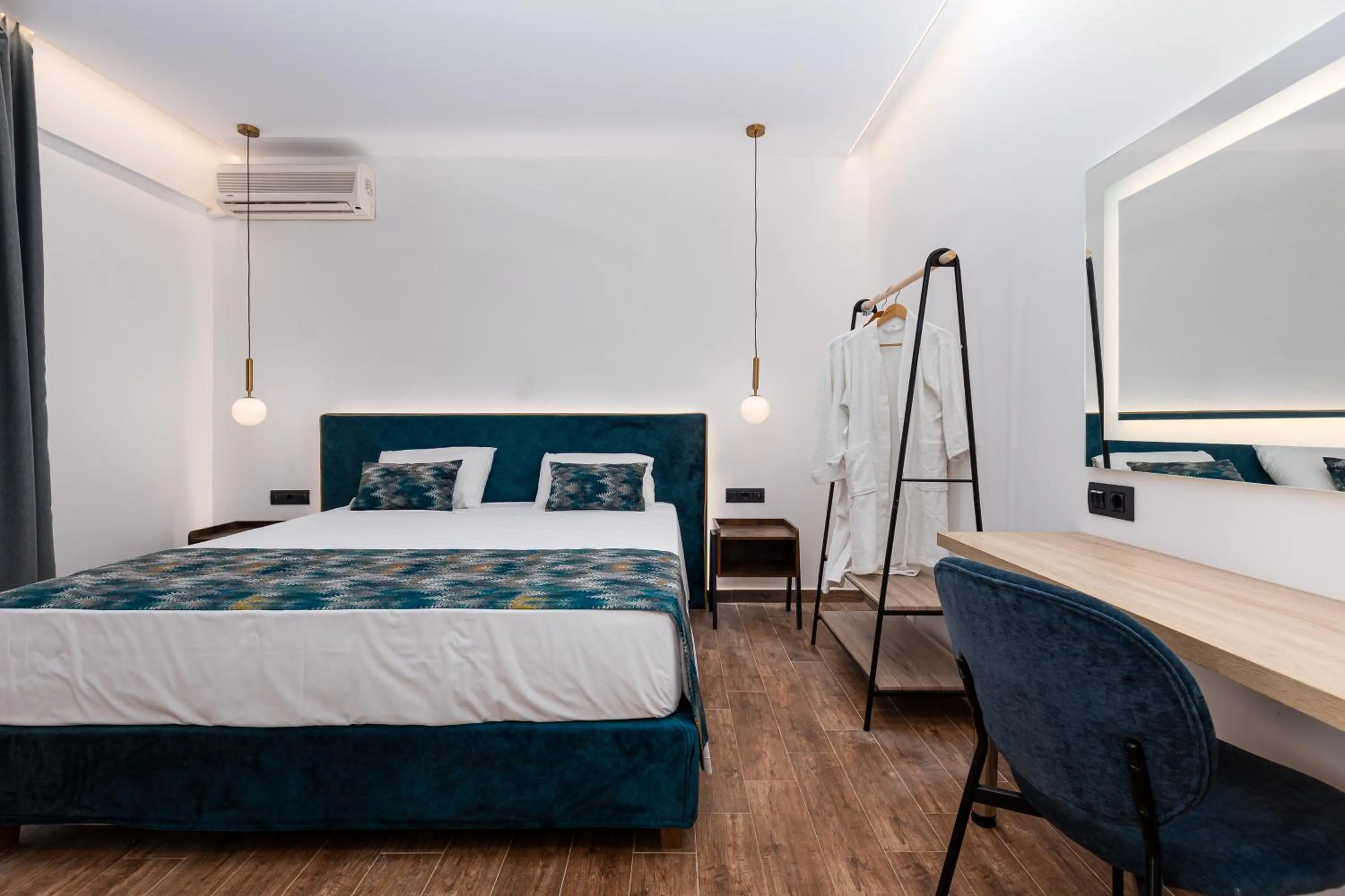 Bed in Sirocco Hotel