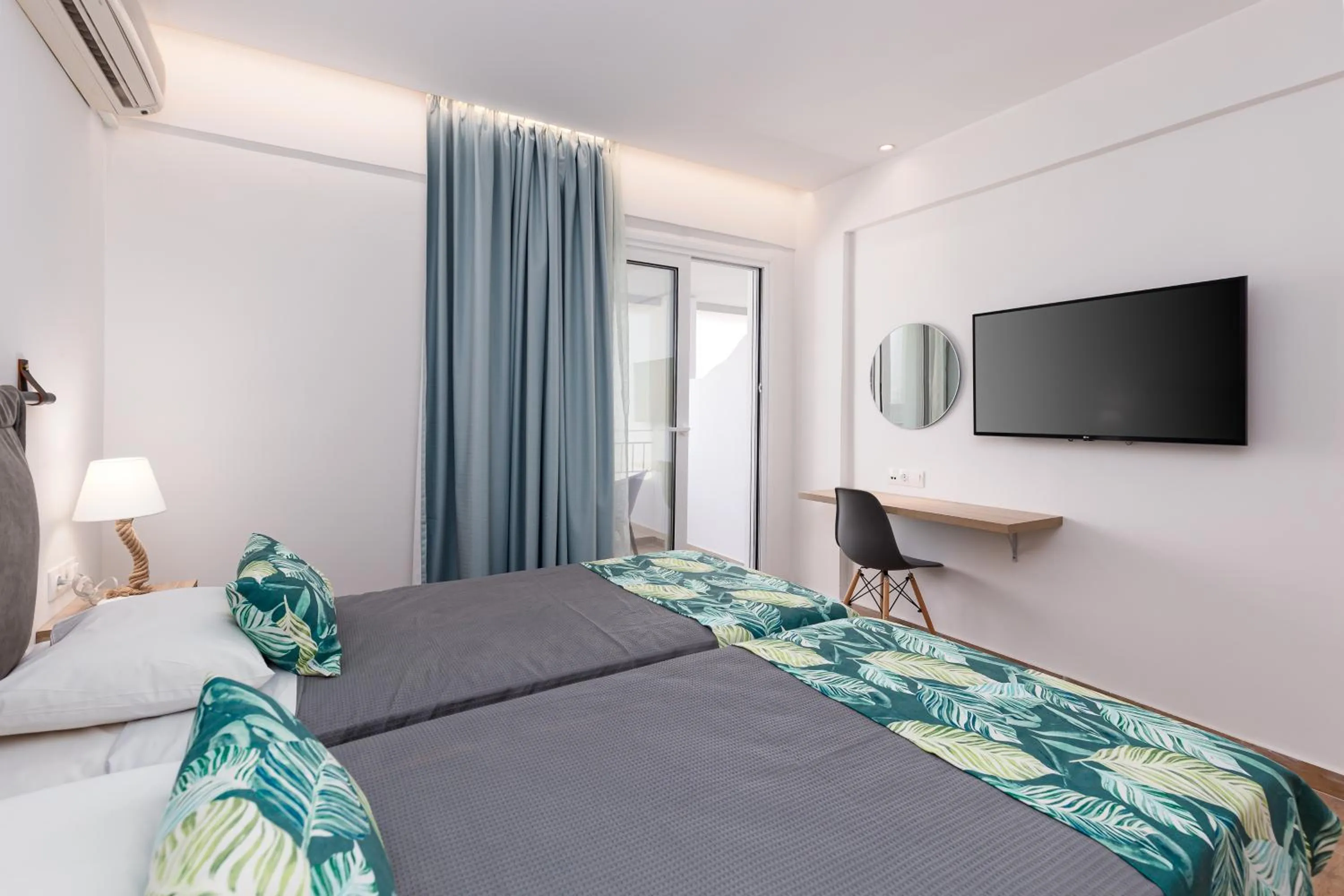 Bed in Sirocco Hotel