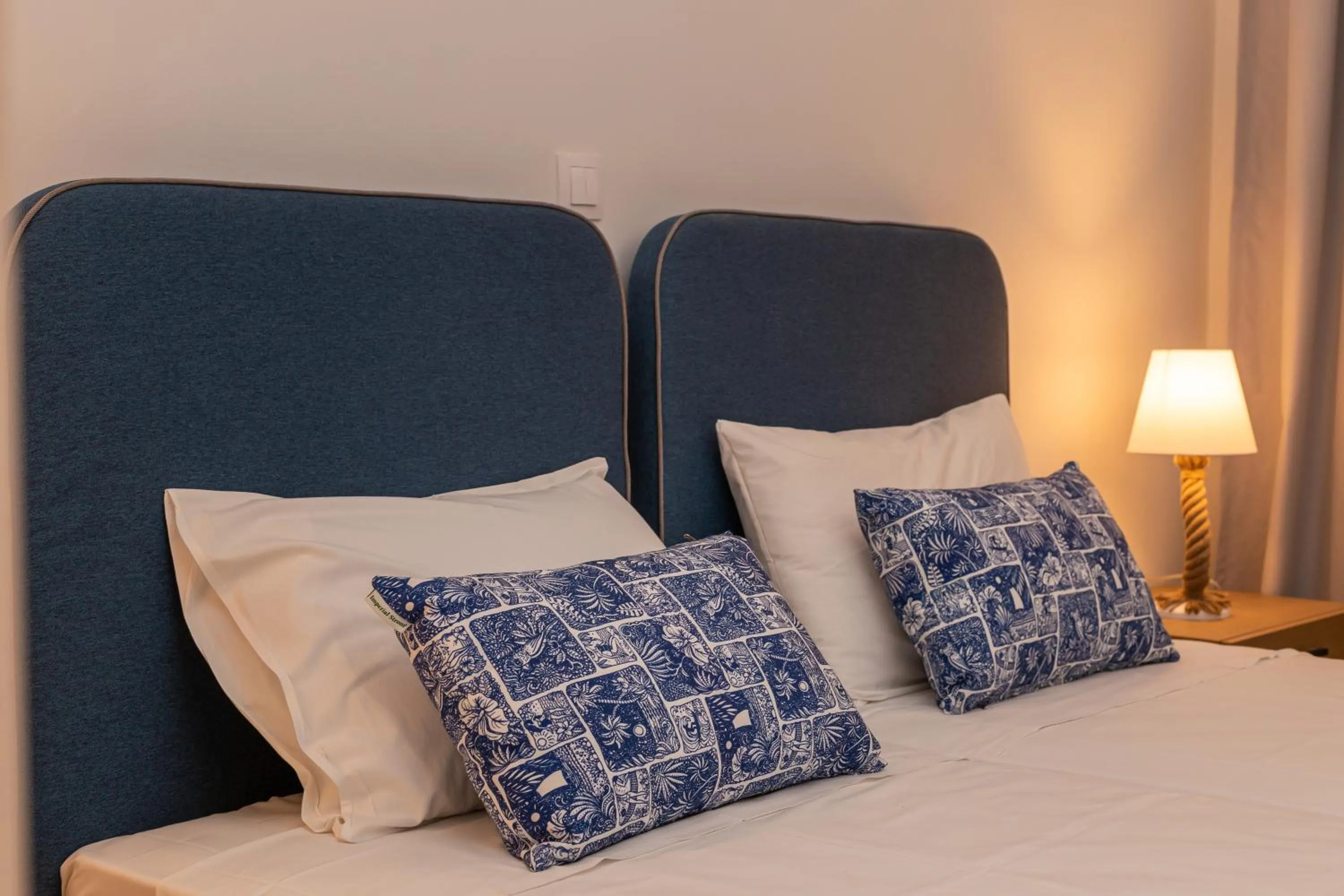 Bed in Sirocco Hotel