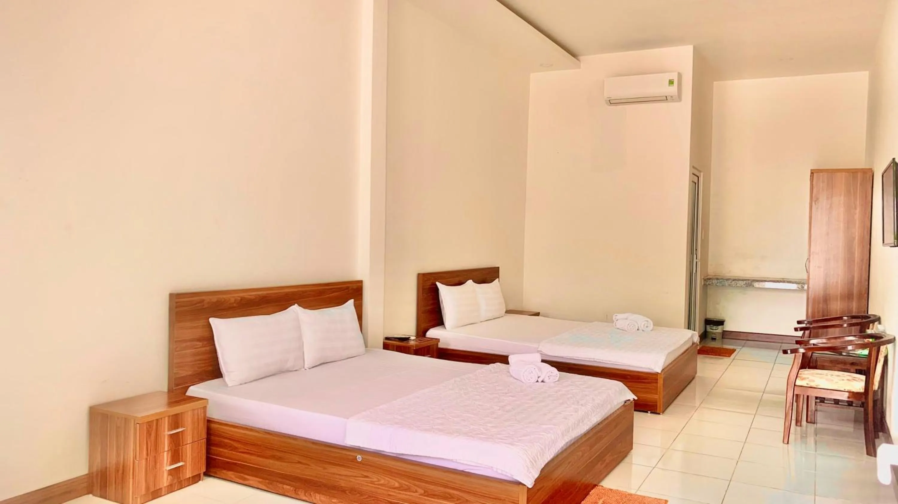 Living room, Bed in Phú Quốc Hotel