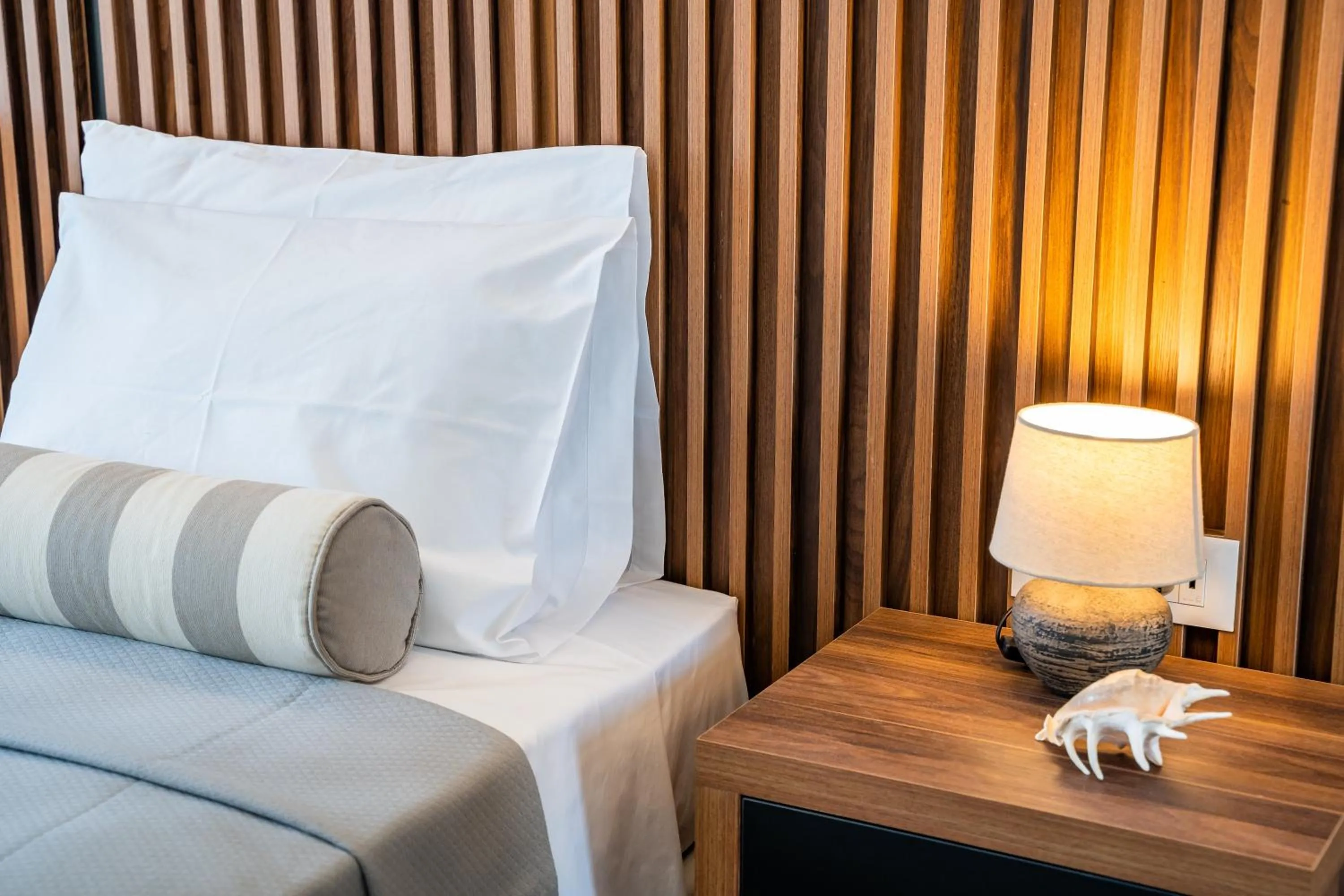 Bed in Apolis Beachscape Hotel