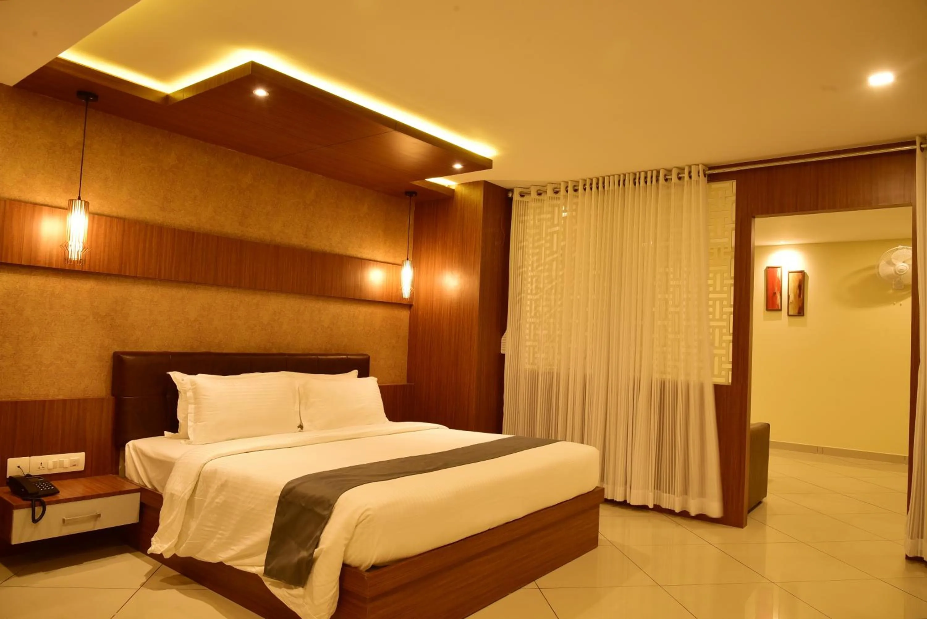 Bed in WHITE SUITE HOTEL