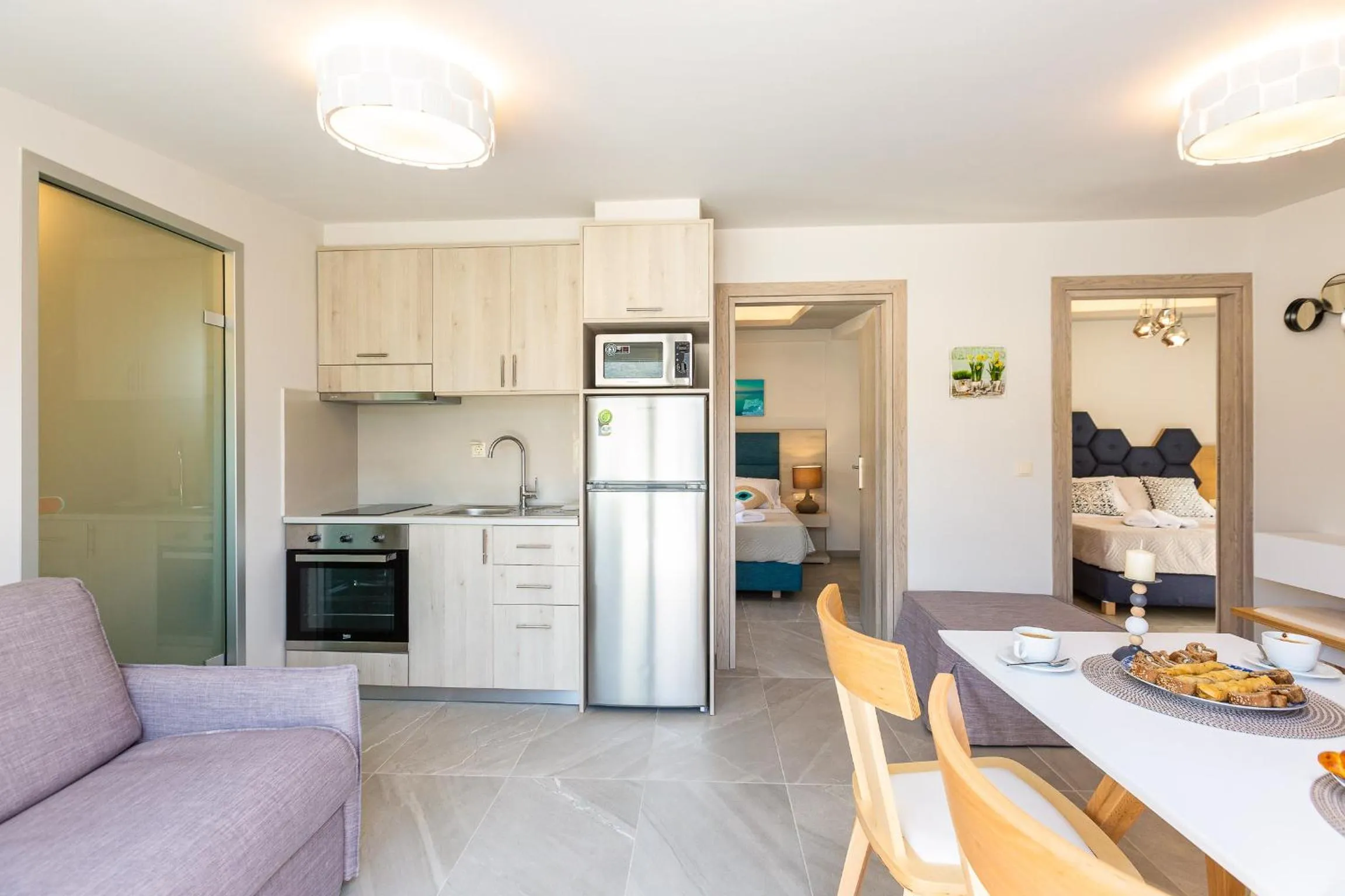 Kitchen or kitchenette in Akrogiali Apartments