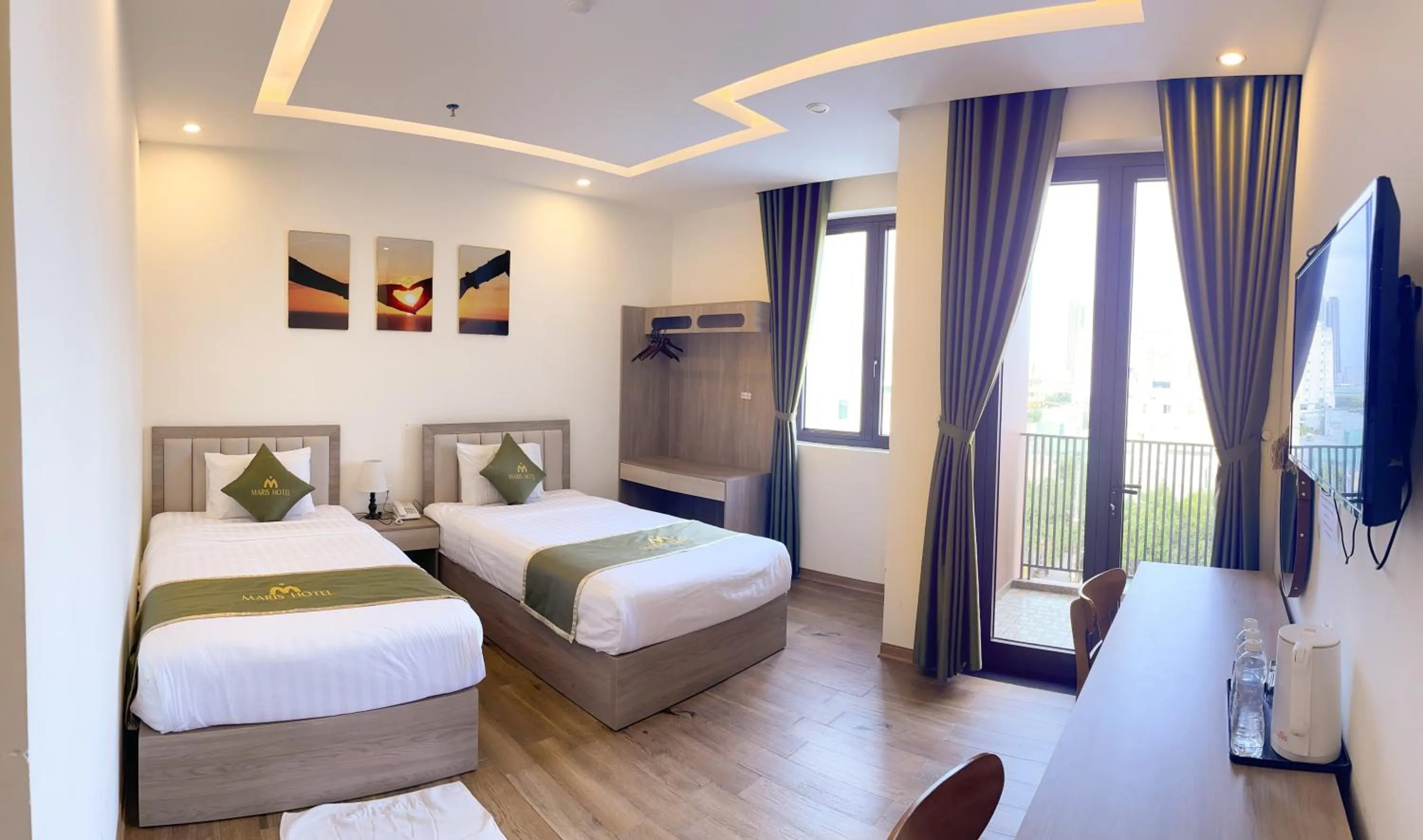 Bed in Maris Da Nang Hotel & Apartment