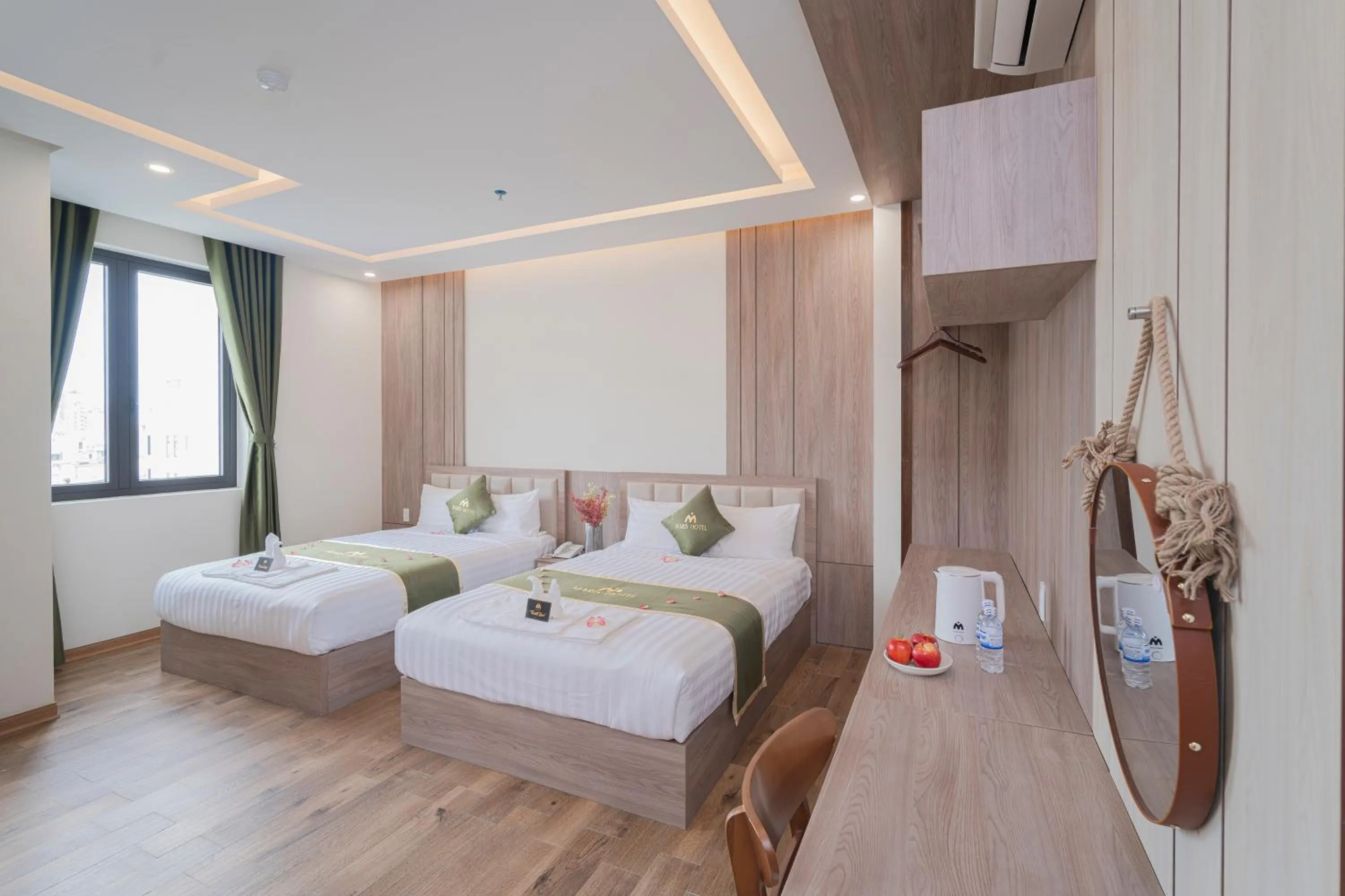 Photo of the whole room, Bed in Maris Da Nang Hotel & Apartment