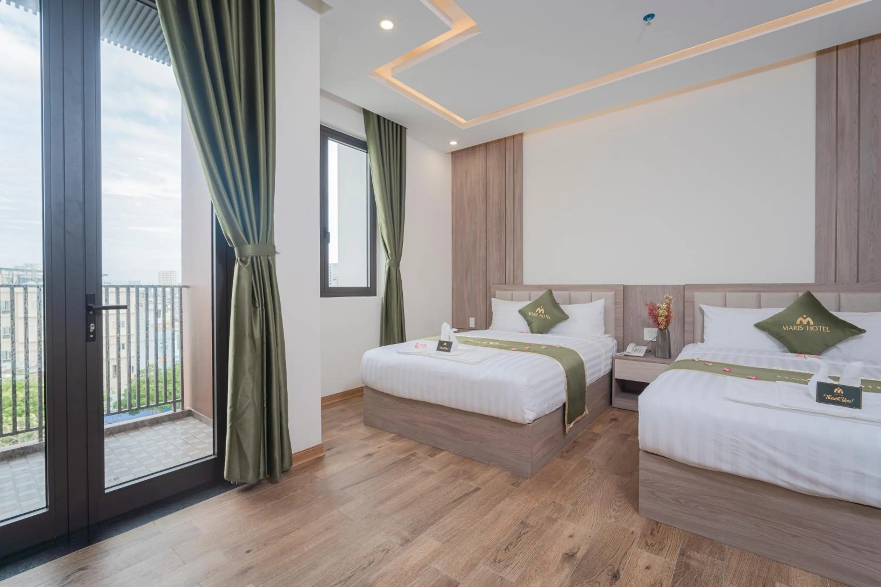 Bed in Maris Da Nang Hotel & Apartment