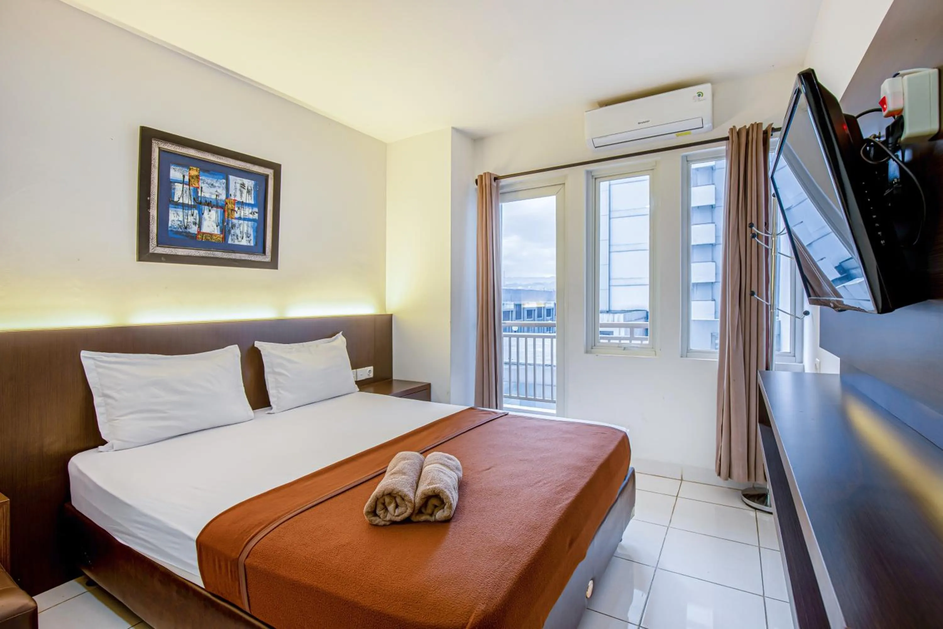 Bed in Skyview Sentul Tower Apartments