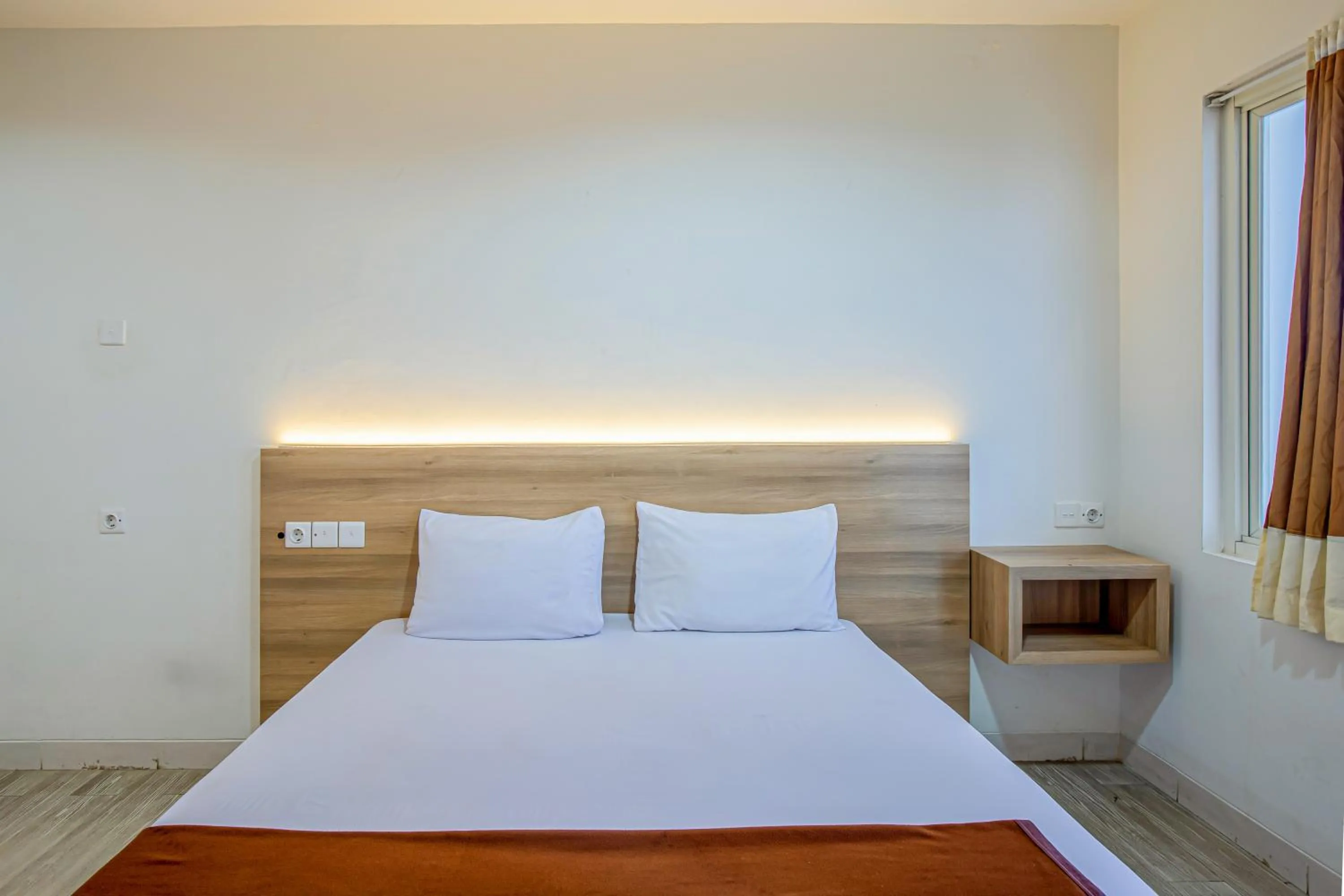 Bed in Skyview Sentul Tower Apartments