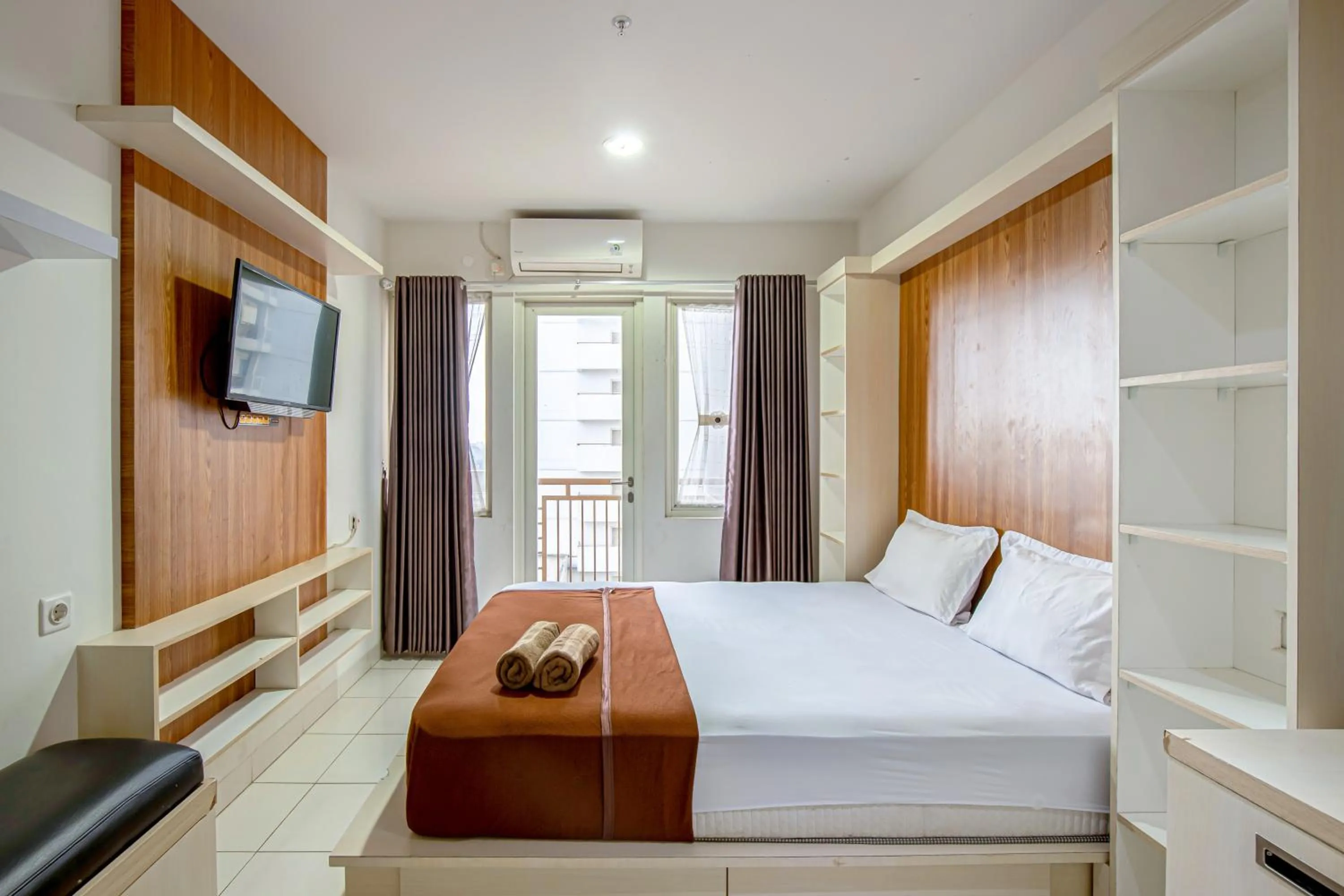 Bed in Skyview Sentul Tower Apartments