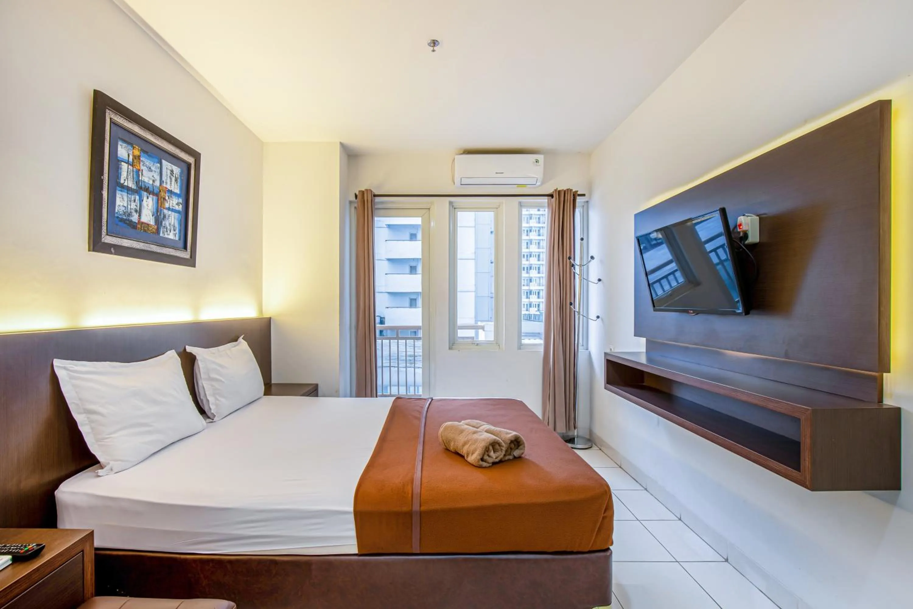 Bed in Skyview Sentul Tower Apartments