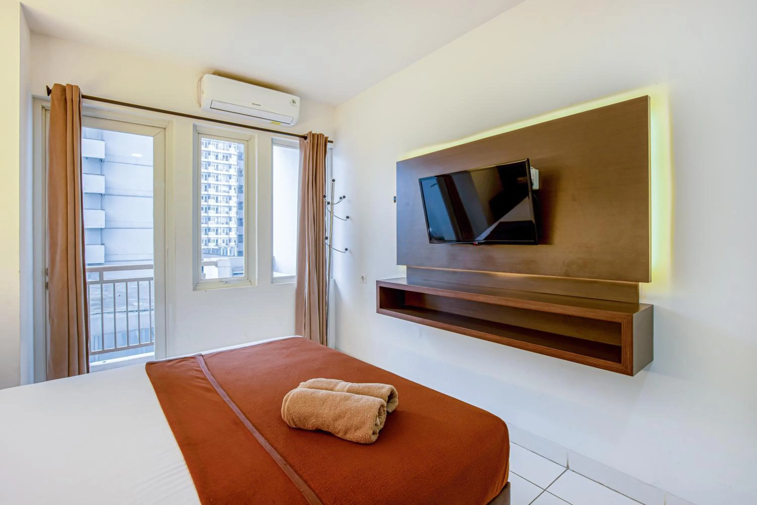 Bed in Skyview Sentul Tower Apartments