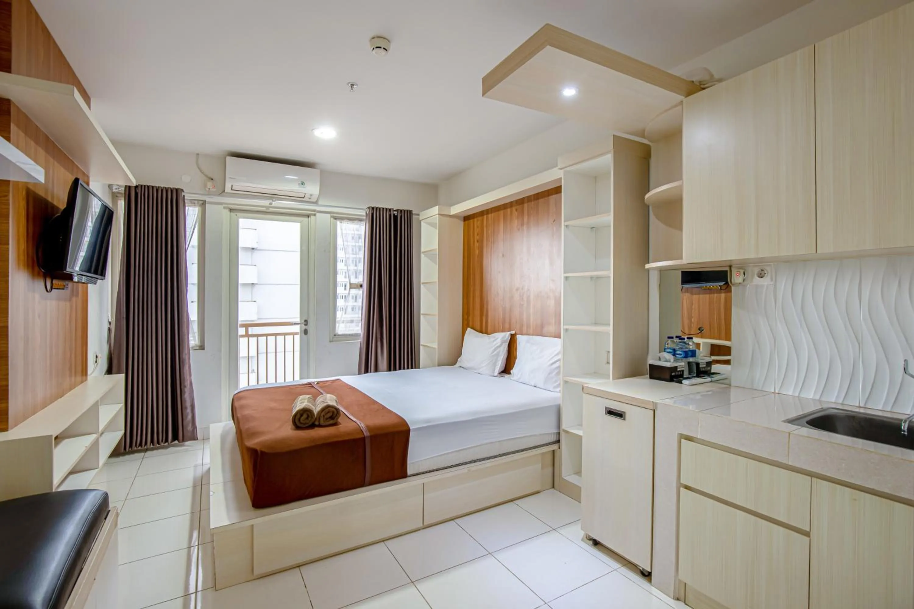 Bed in Skyview Sentul Tower Apartments