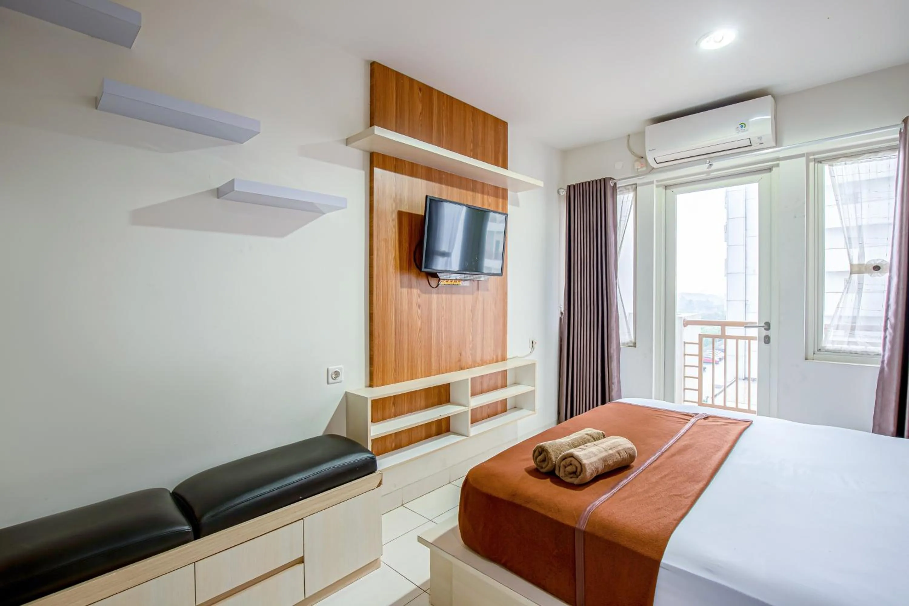 Bed in Skyview Sentul Tower Apartments