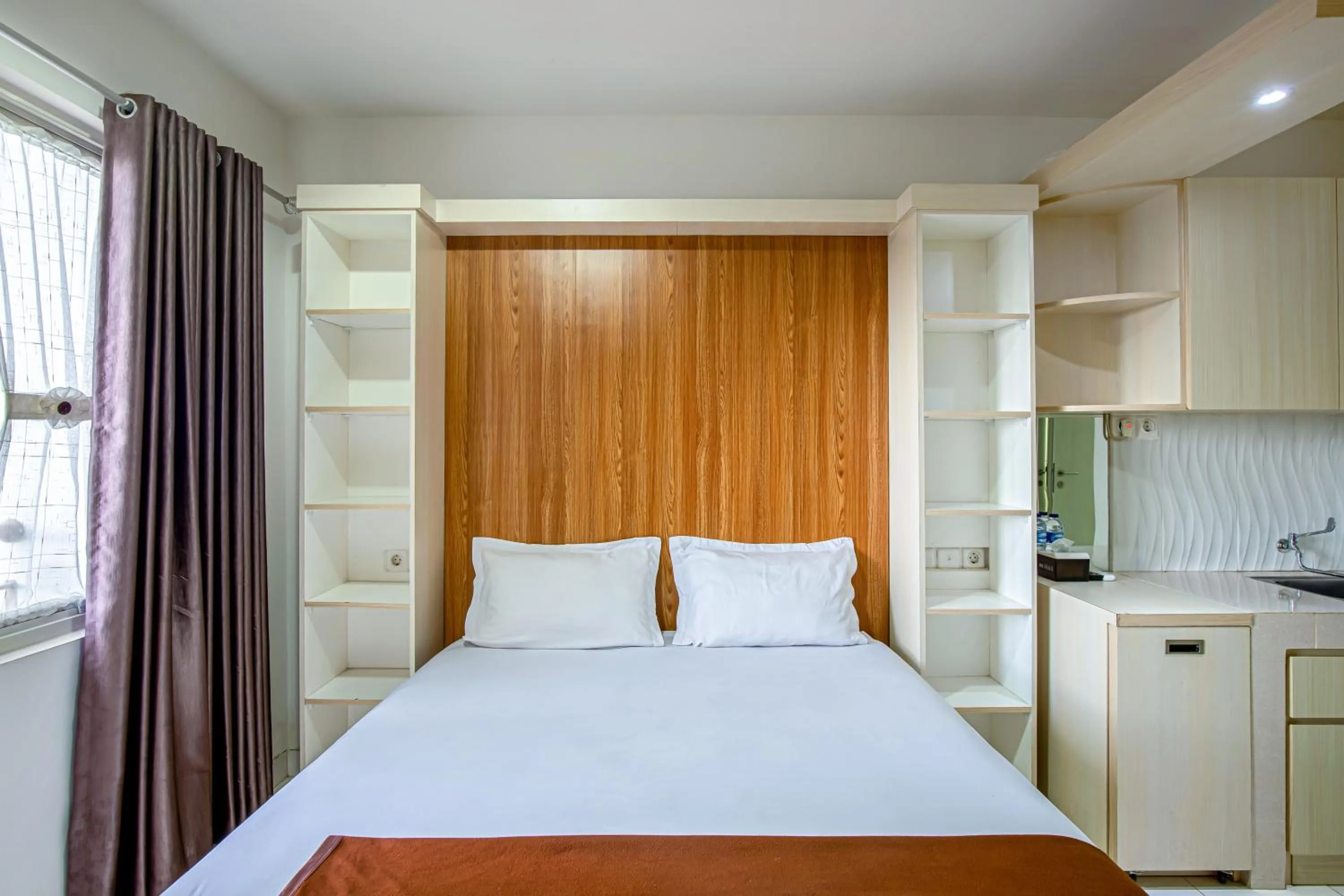 Bed in Skyview Sentul Tower Apartments