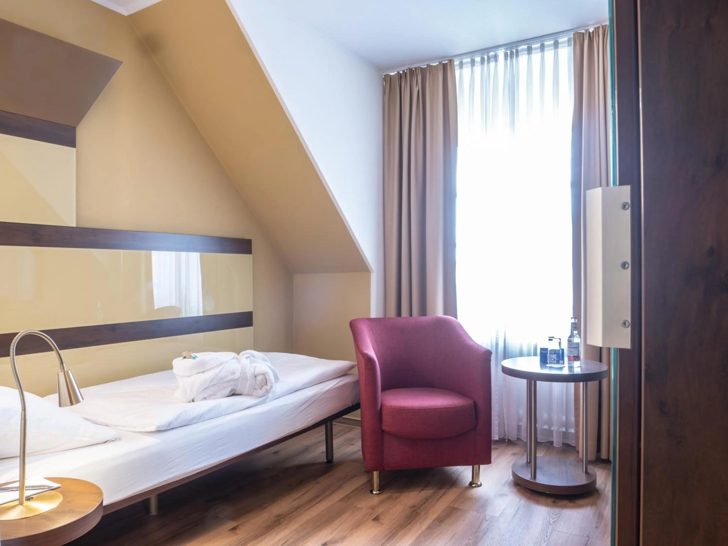 Photo of the whole room, Bed in Hotel Osterkrug