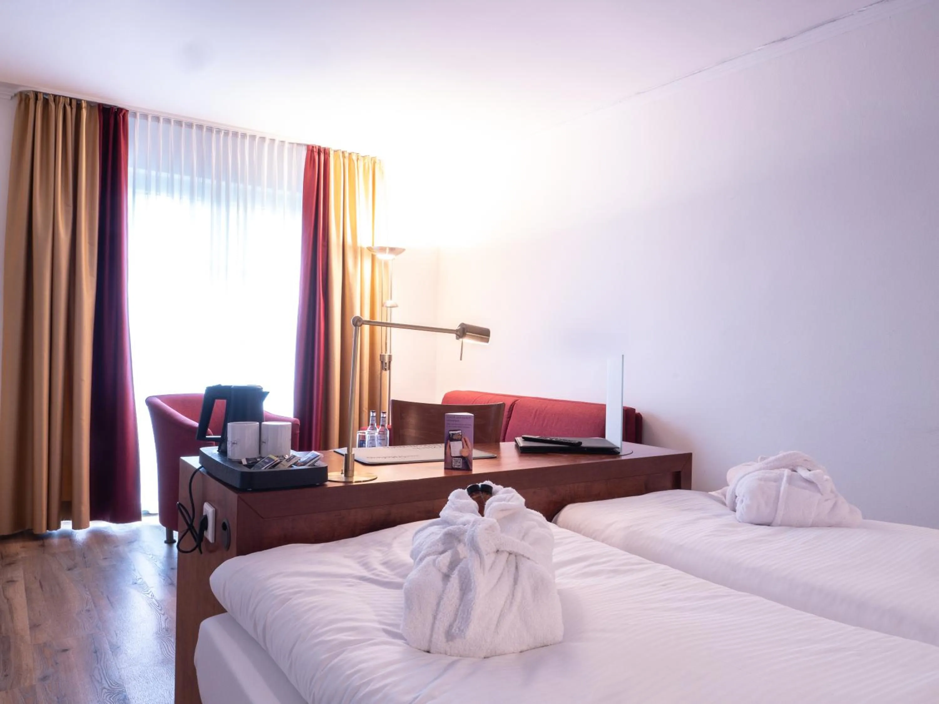 Photo of the whole room, Bed in Hotel Osterkrug