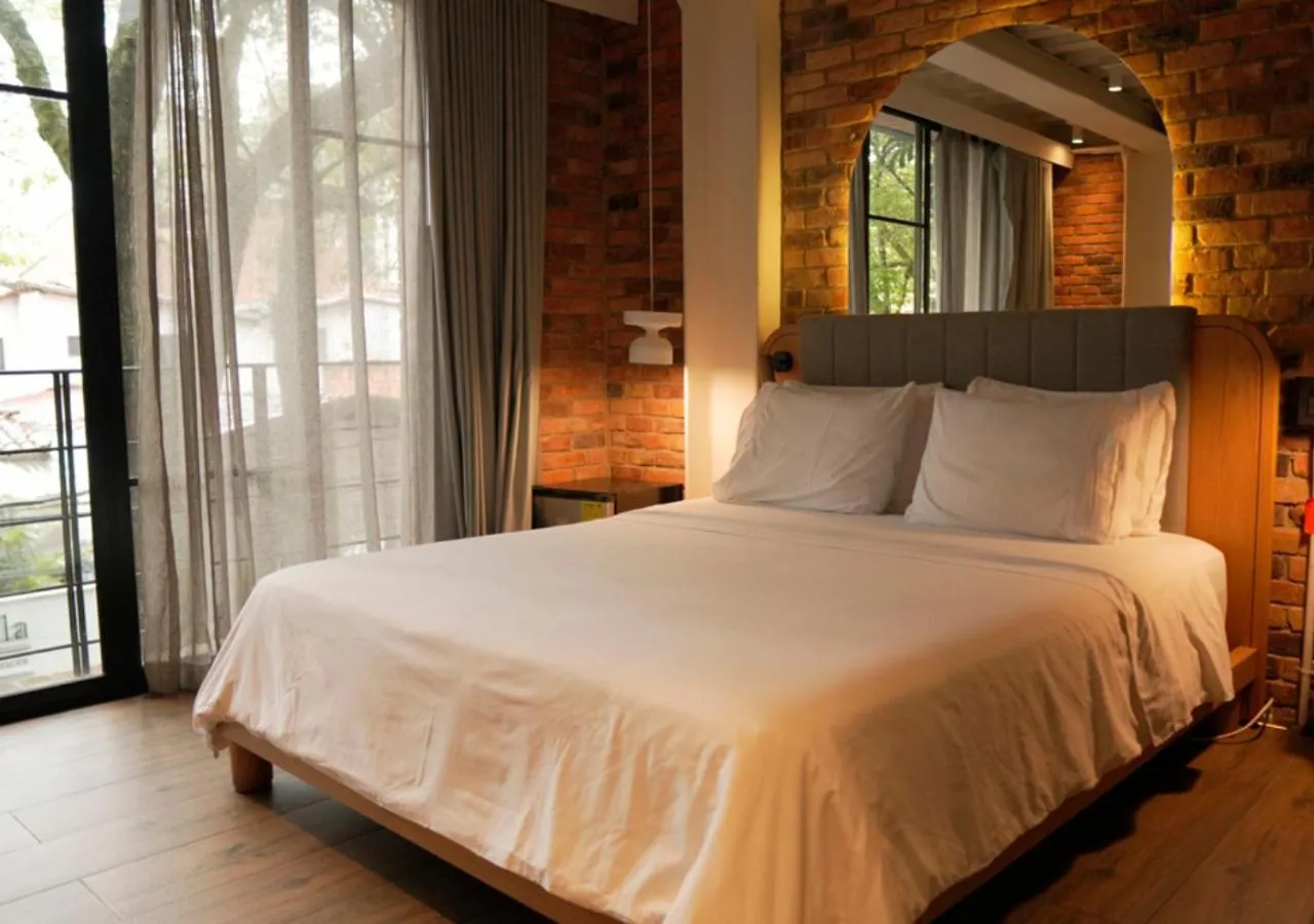 Balcony/Terrace, Bed in Nomada Hotel Origen