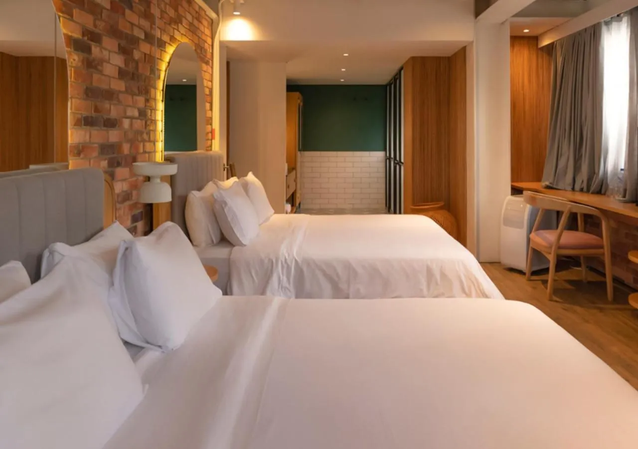 Bed in Nomada Hotel Origen