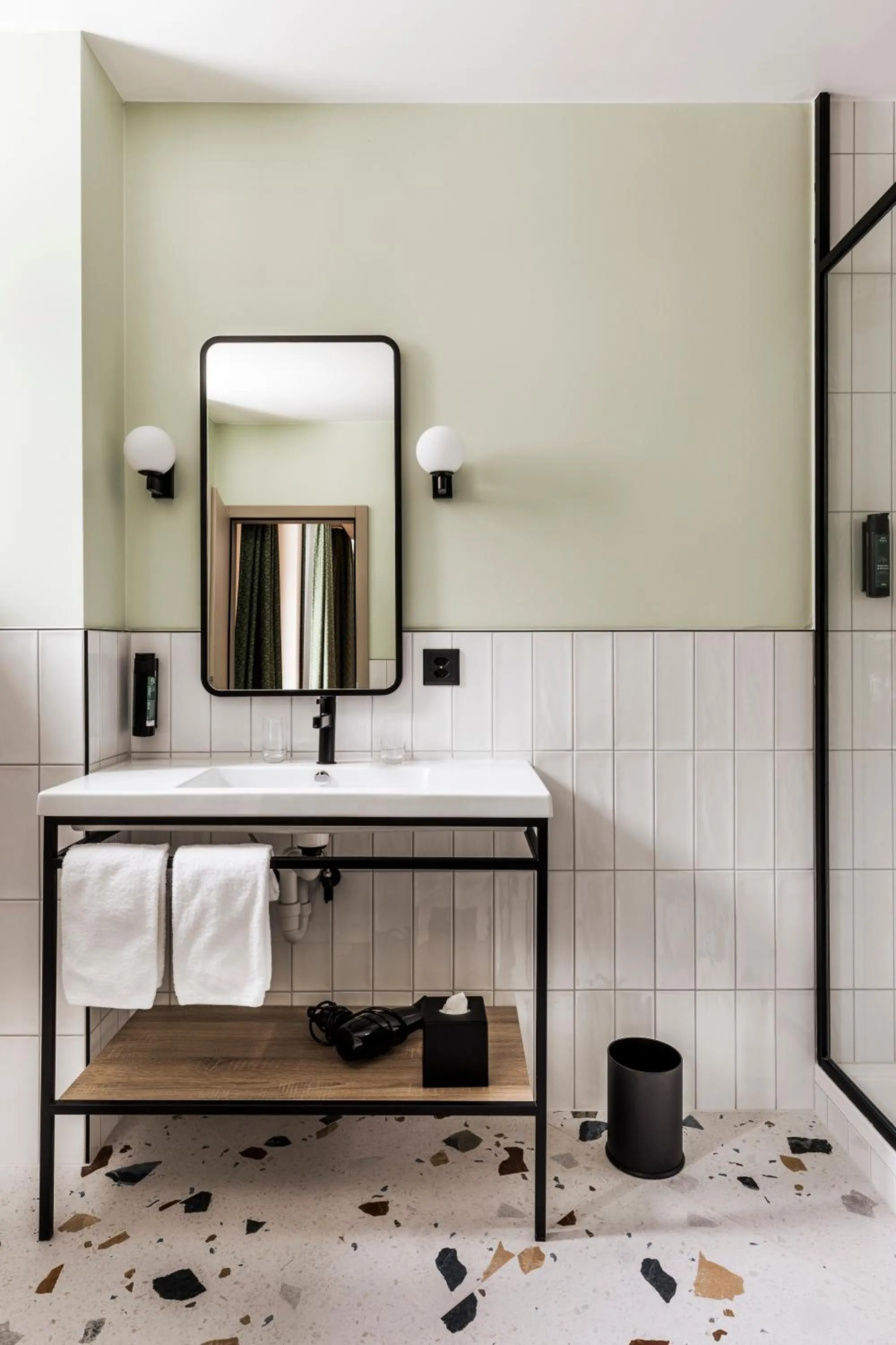 Bathroom in Hotel Valaisia Crans Montana, a Faern Collection Resort