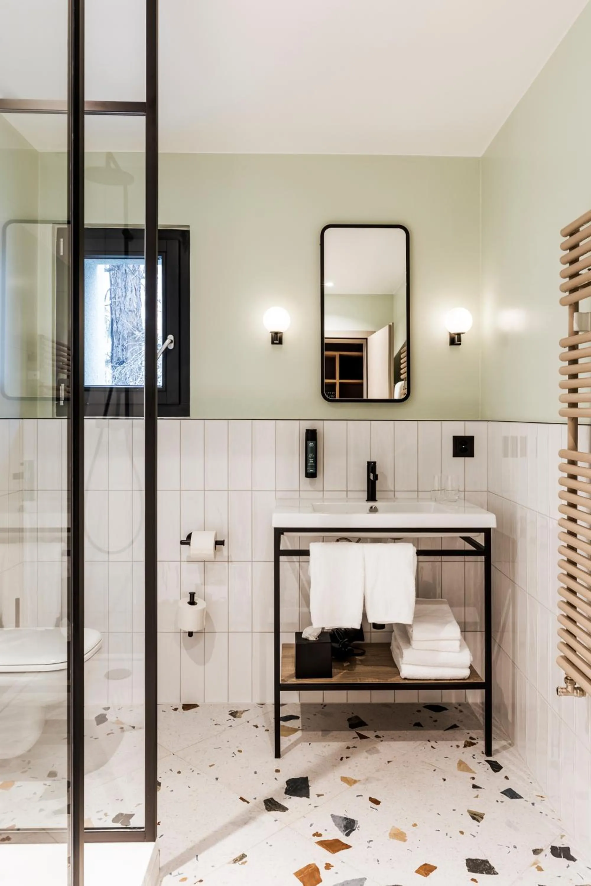 Bathroom in Hotel Valaisia Crans Montana, a Faern Collection Resort