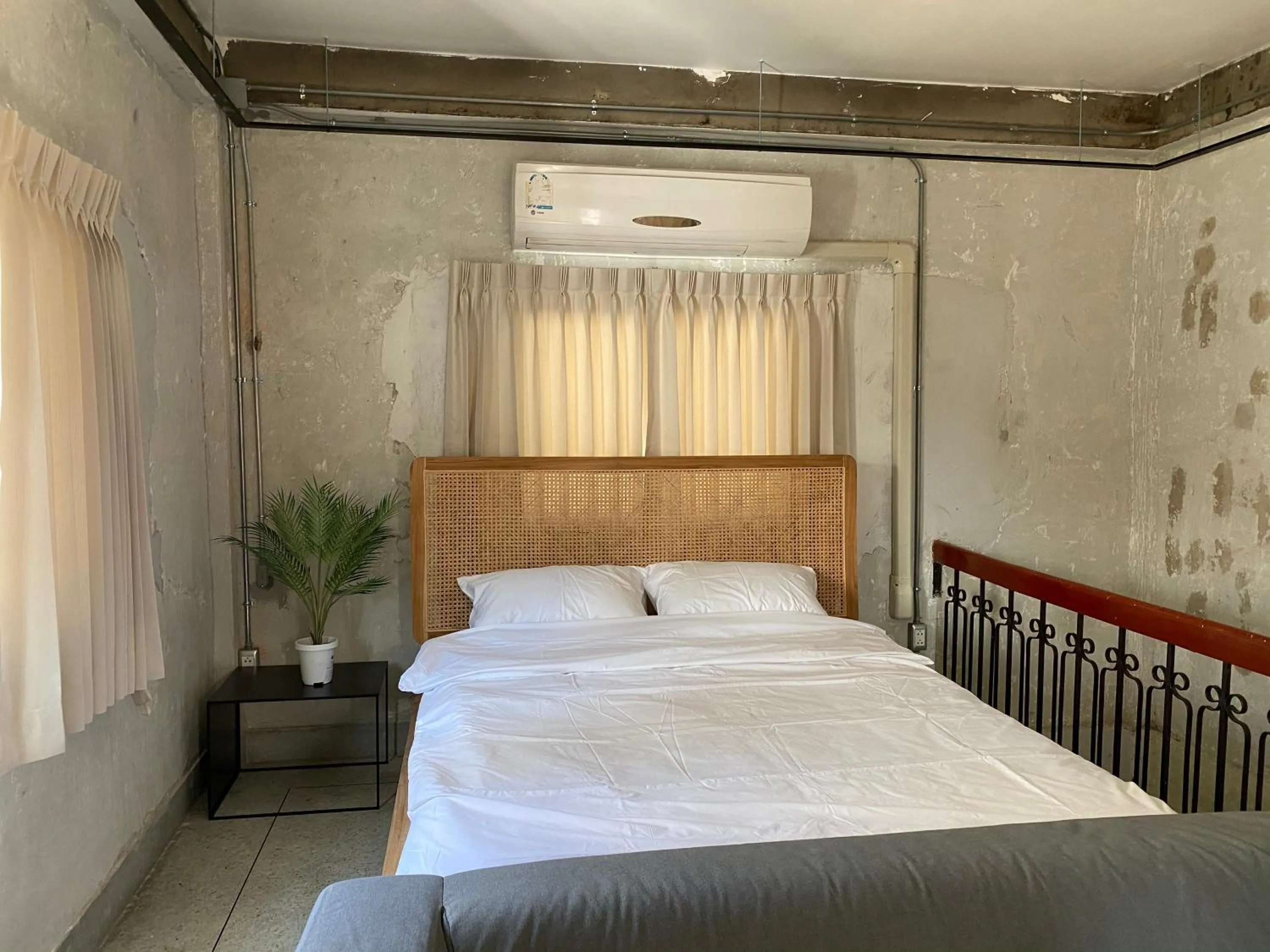 Photo of the whole room, Bed in EP1 shophouse