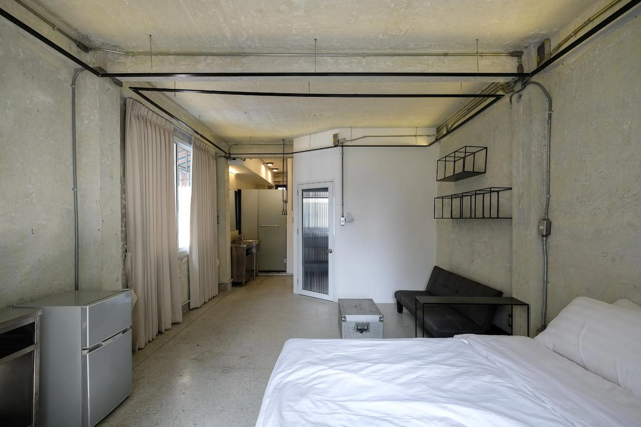 Photo of the whole room, Bed in EP1 shophouse