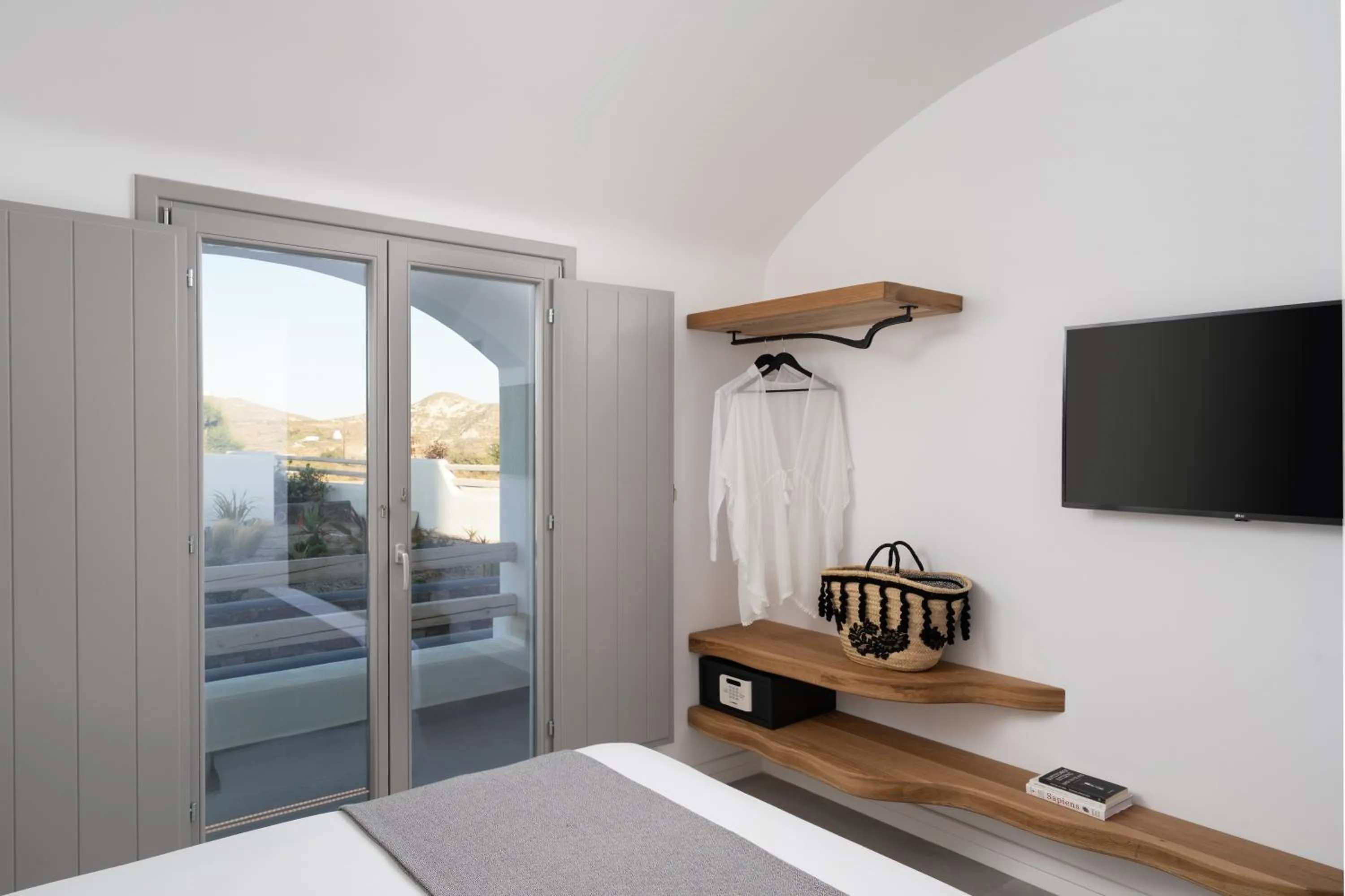 Bedroom in La Ponta Villas & Suites