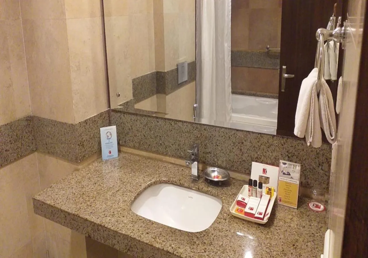 Bathroom in M B Greens Clarks Inn