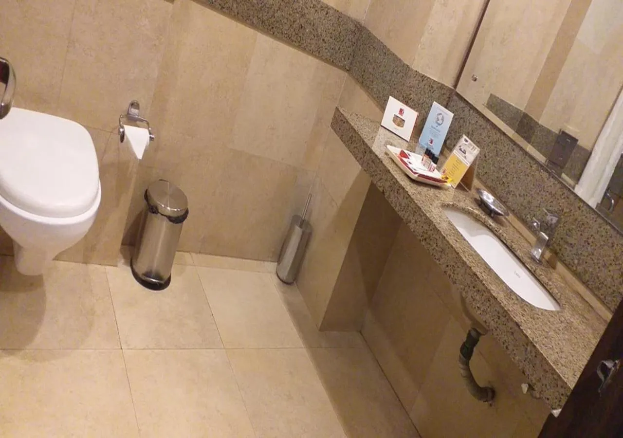 Bathroom in M B Greens Clarks Inn