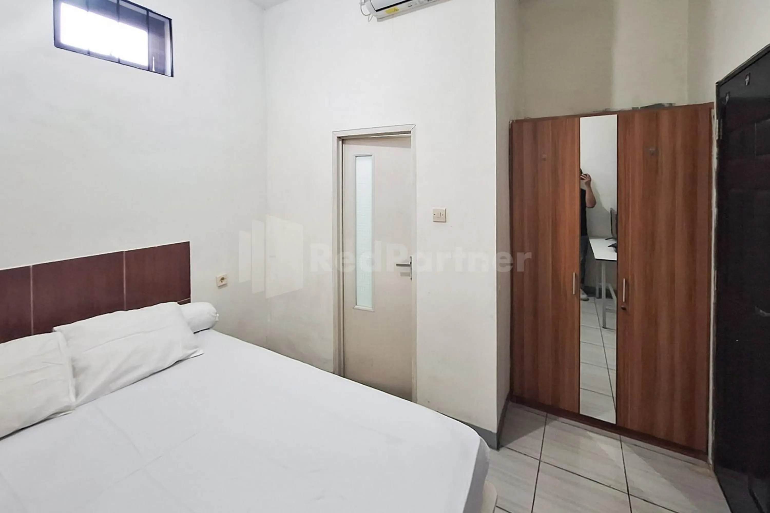 Bed in Joy Homestay At Pulomas RedPartner