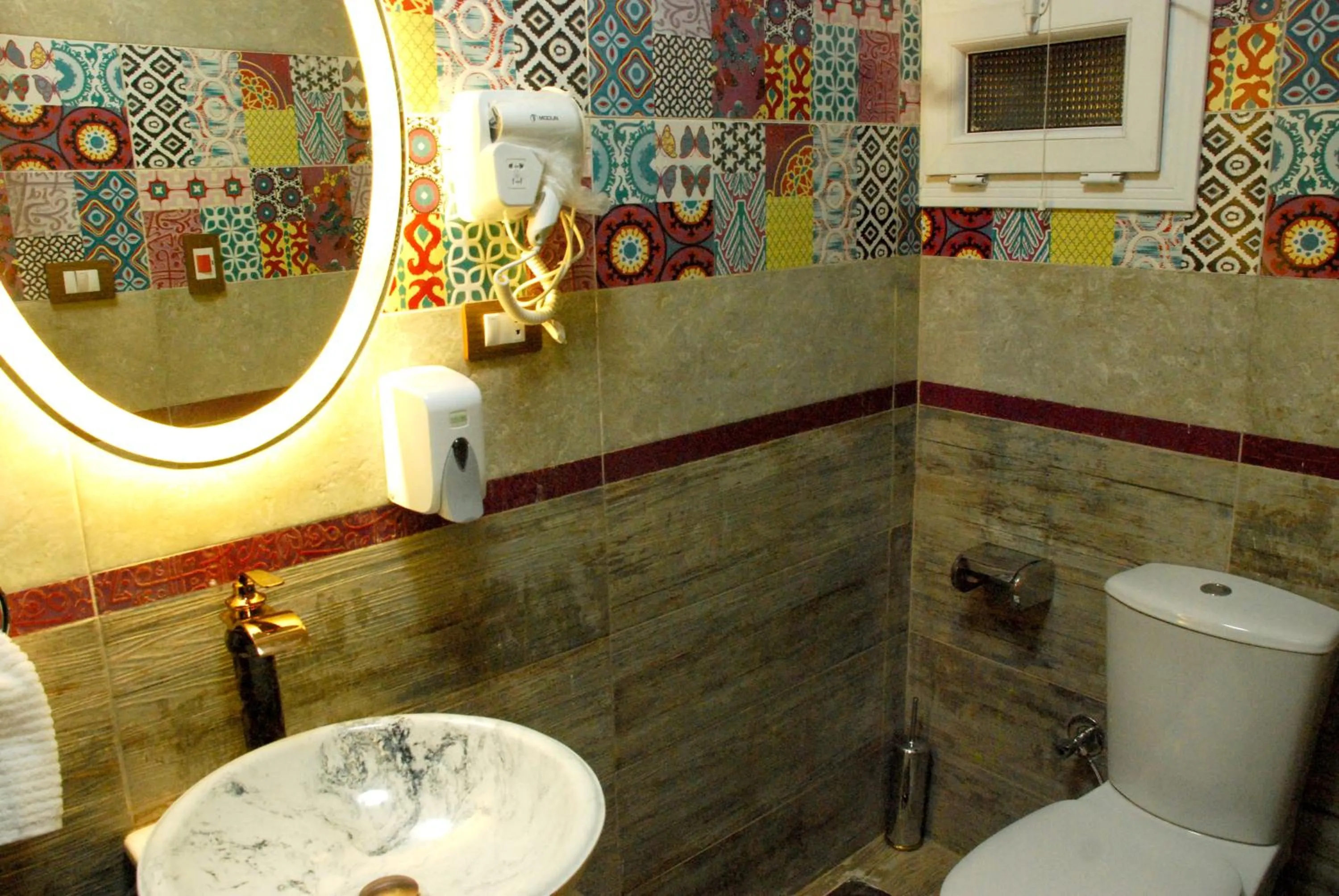 Bathroom in Pyramids Planet Hotel