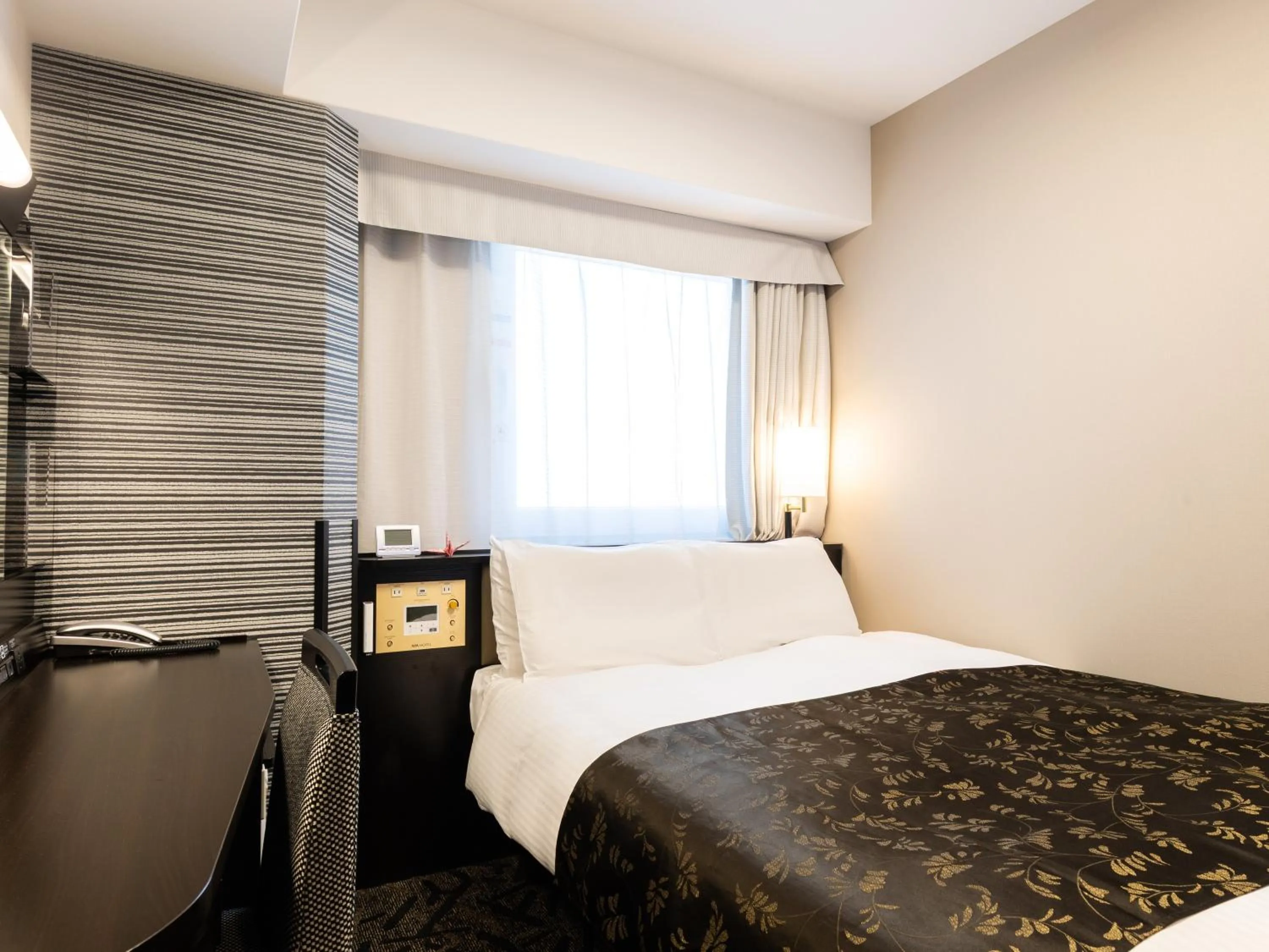 Photo of the whole room, Bed in APA Hotel Osaka Temmabashi Ekimae