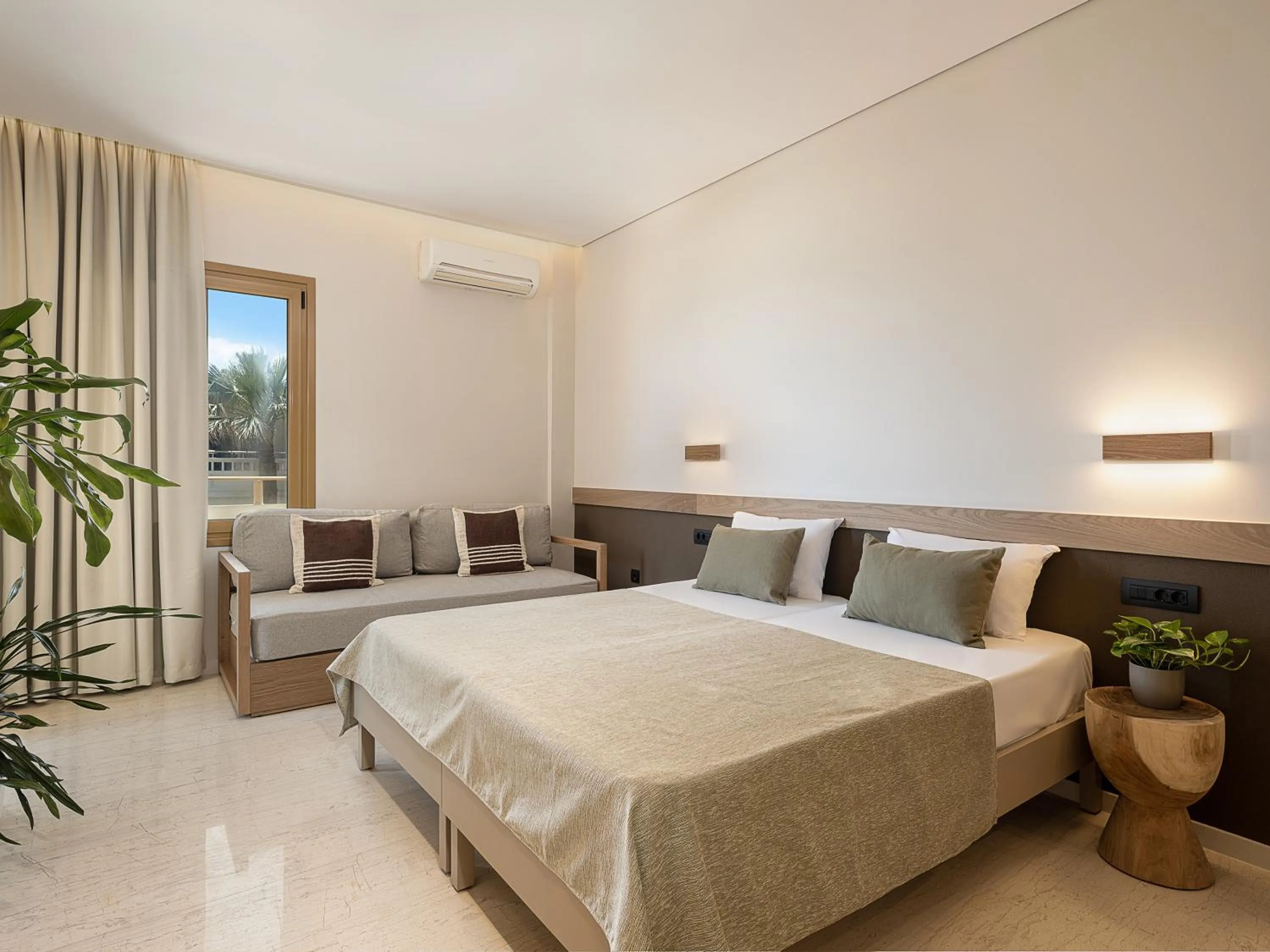 Bed in Esperides Beach Hotel Apartments
