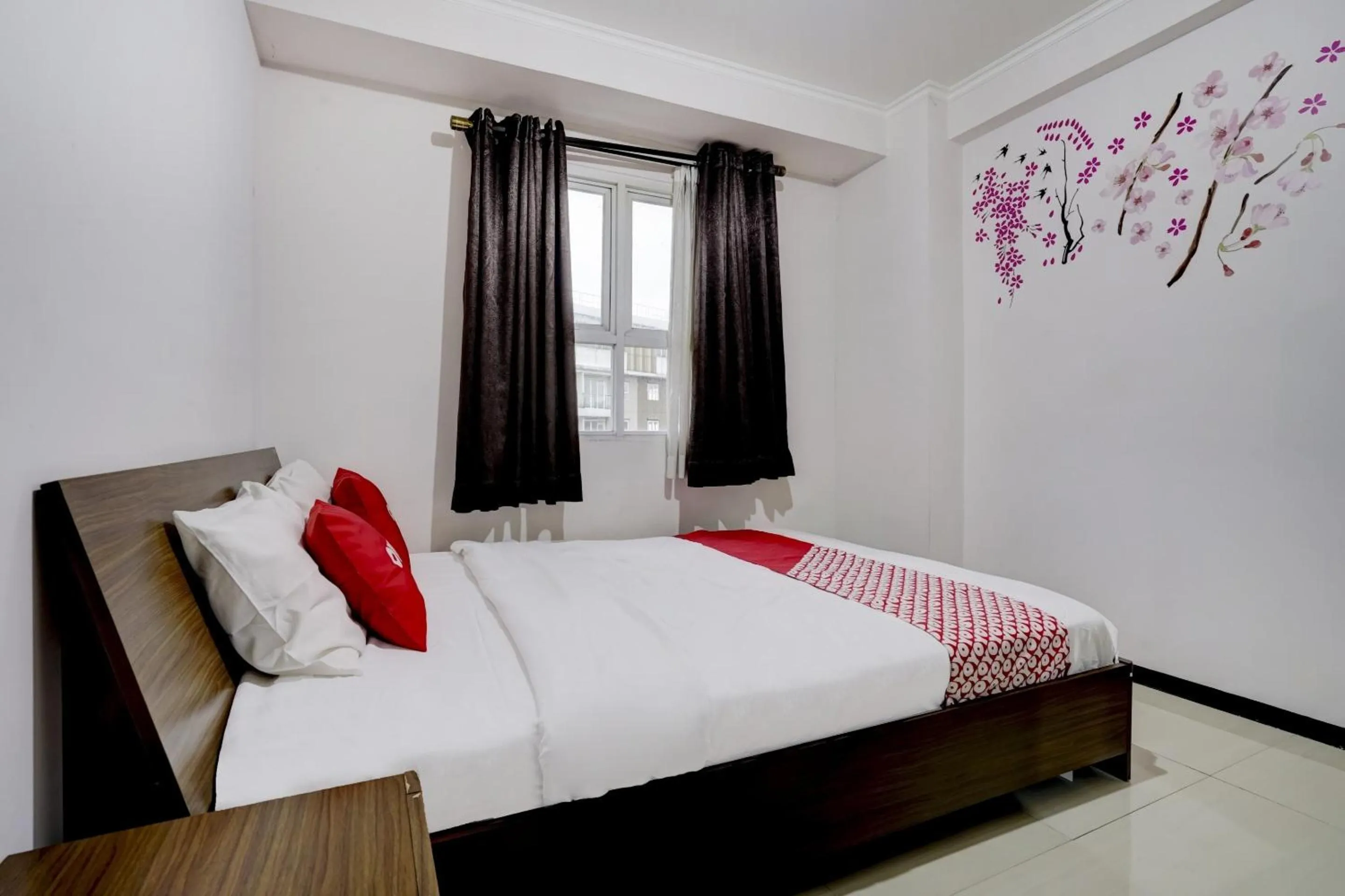 Bedroom in Collection O 90205 Queen Rent Apartment Gateway Pasteur