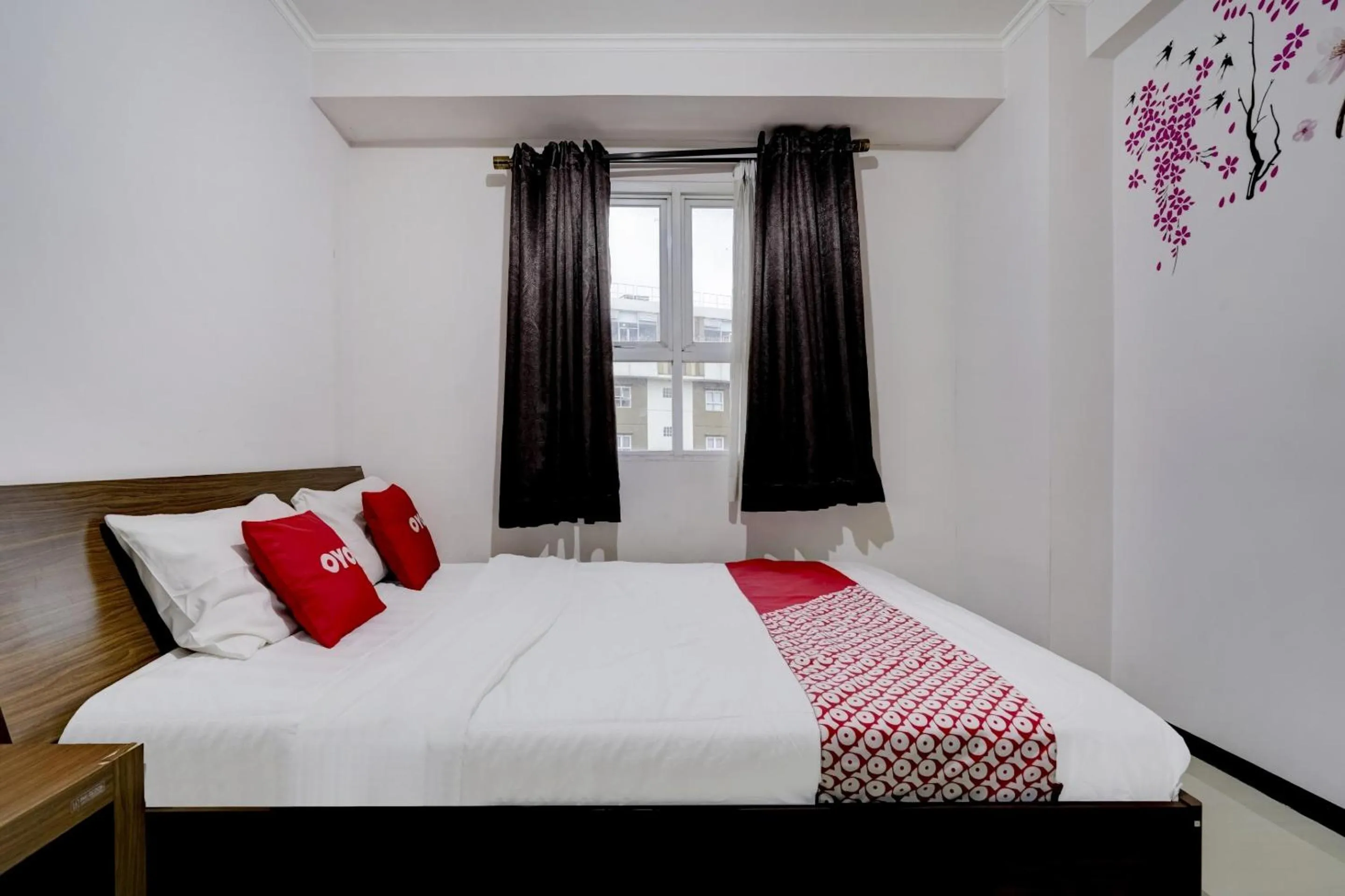 Bedroom in Collection O 90205 Queen Rent Apartment Gateway Pasteur