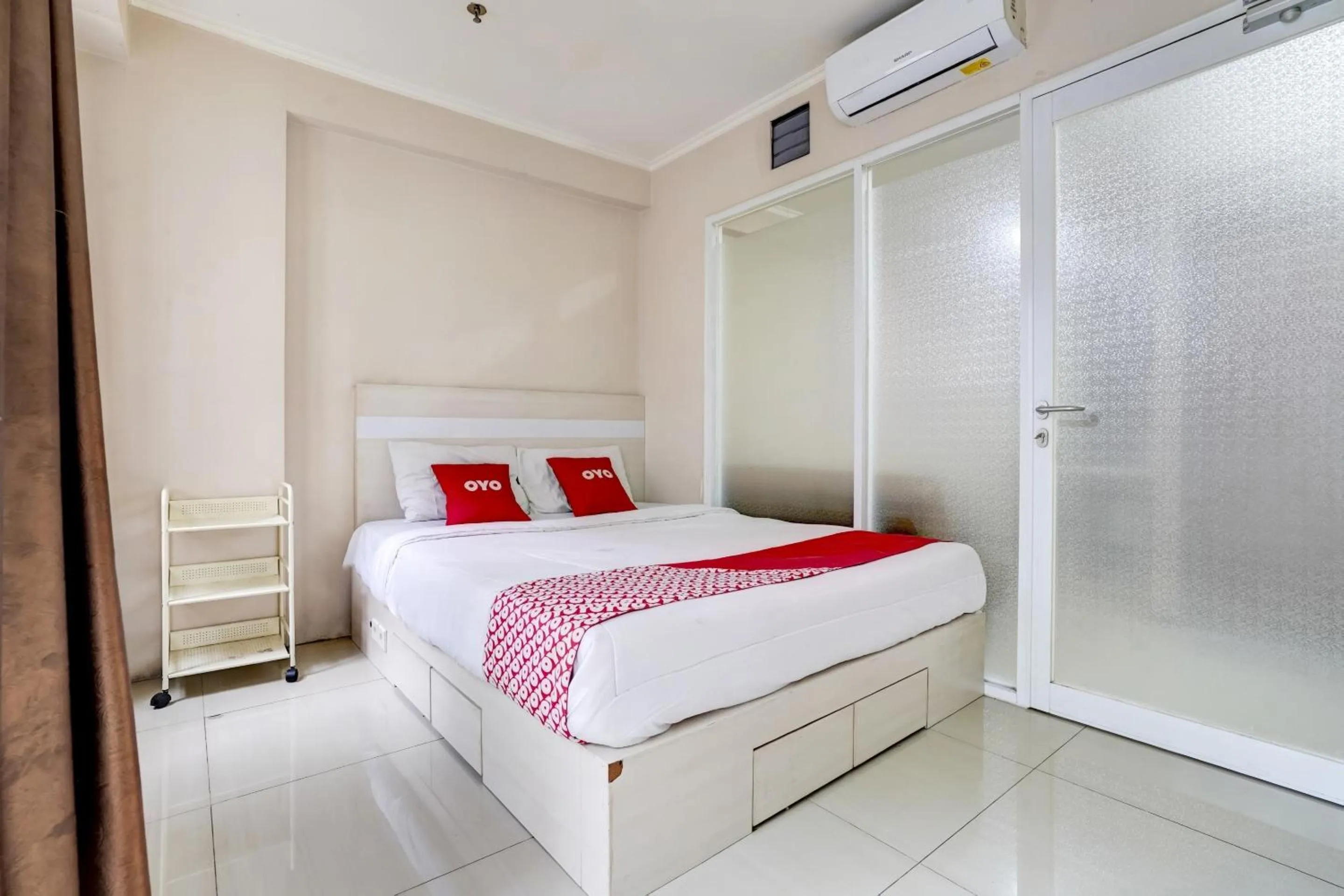 Bedroom in Collection O 90205 Queen Rent Apartment Gateway Pasteur