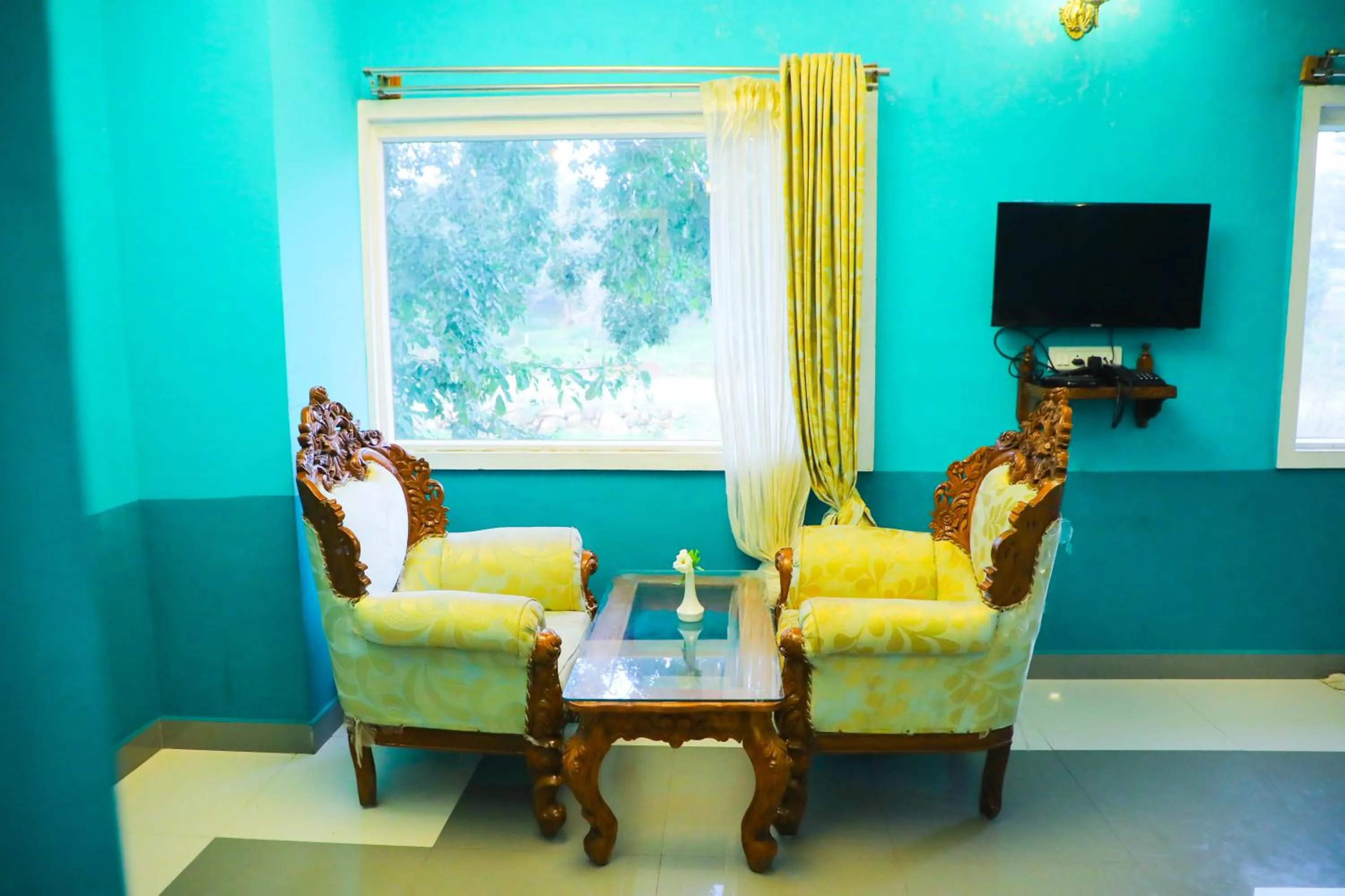 Seating area in Hill Fort Hotel And Resorts Yelagiri Hills