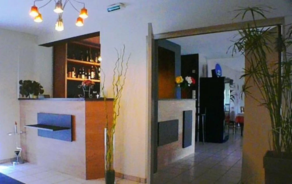 Lounge or bar in Hôtel de la Louée