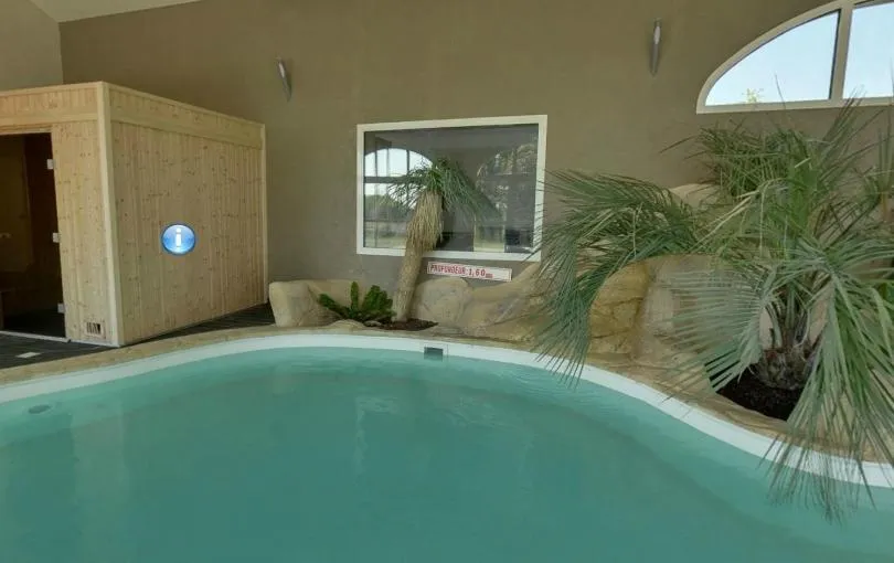 Swimming pool in Hôtel de la Louée