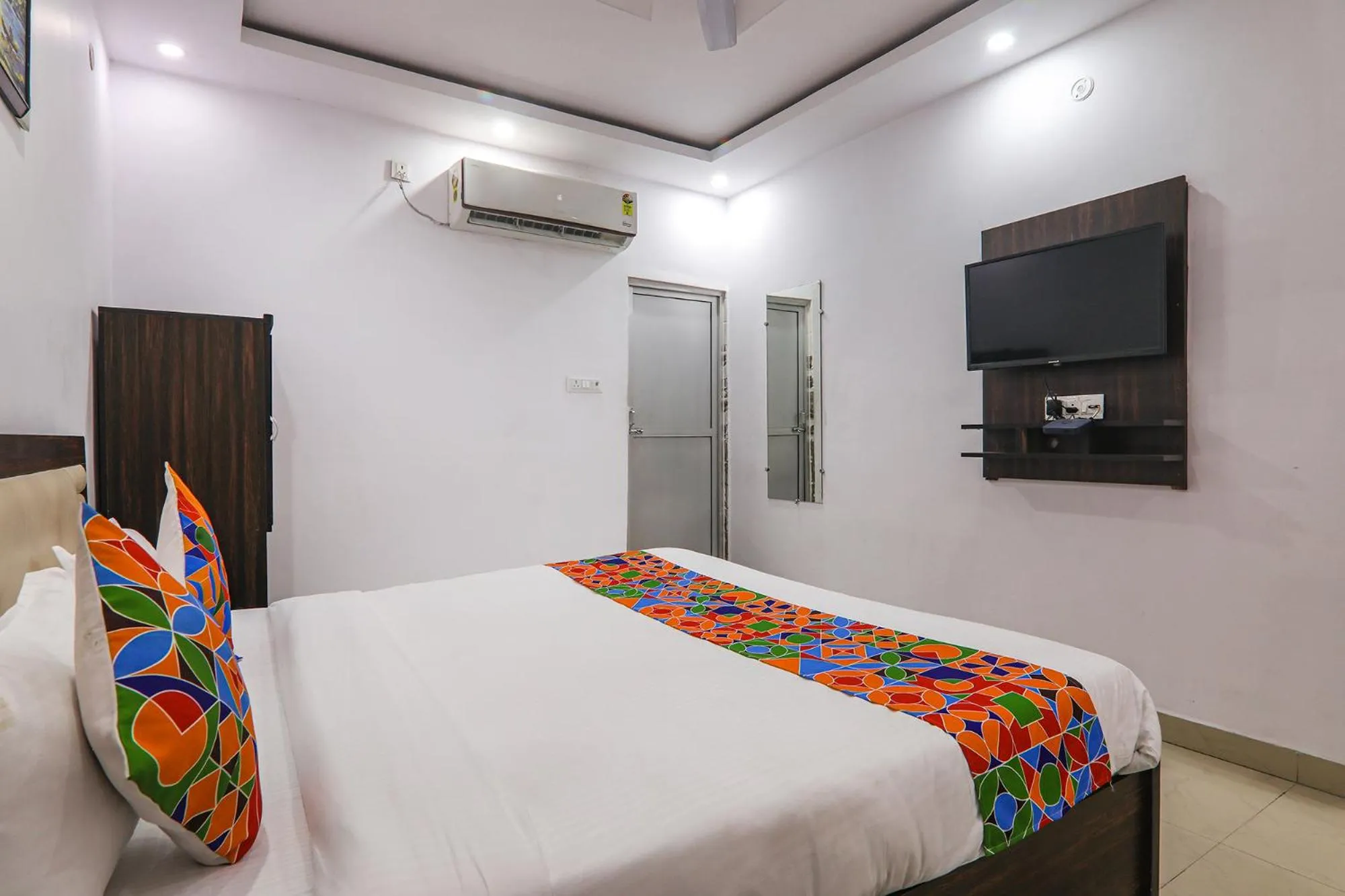 Bed in FabHotel A One Inn