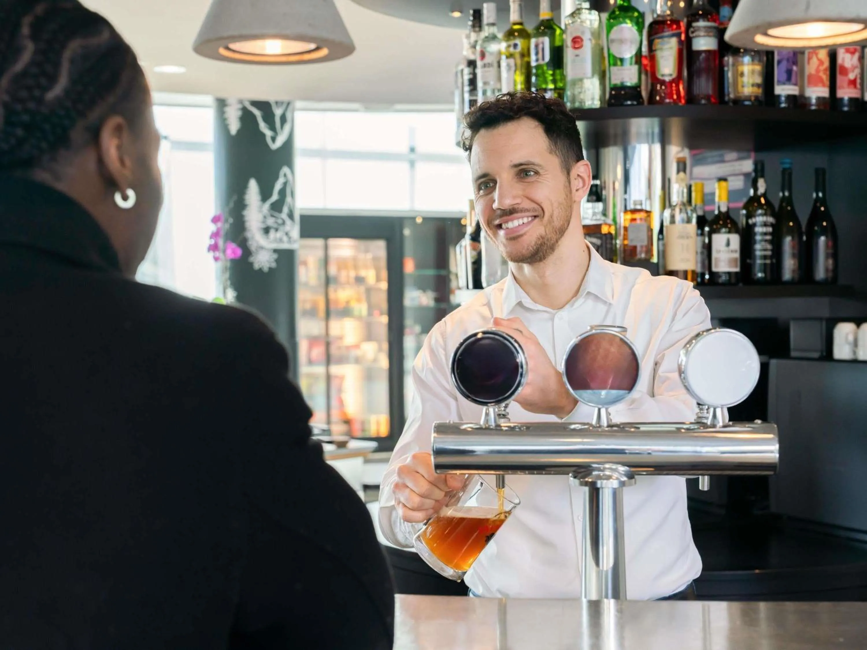 Lounge or bar in Novotel Suites Genève Aéroport