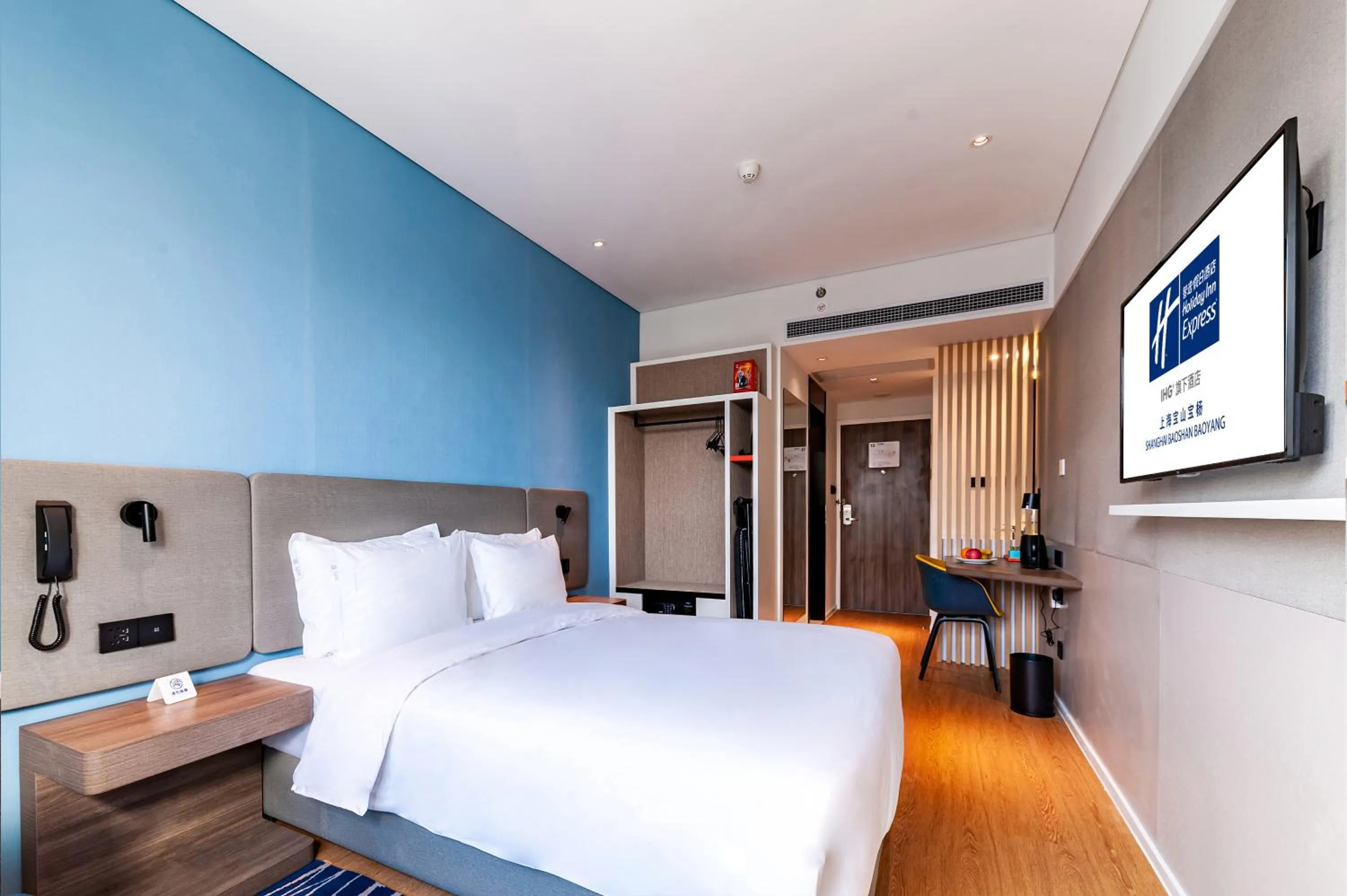 Bed in Holiday Inn Express Shanghai Baoyang by IHG