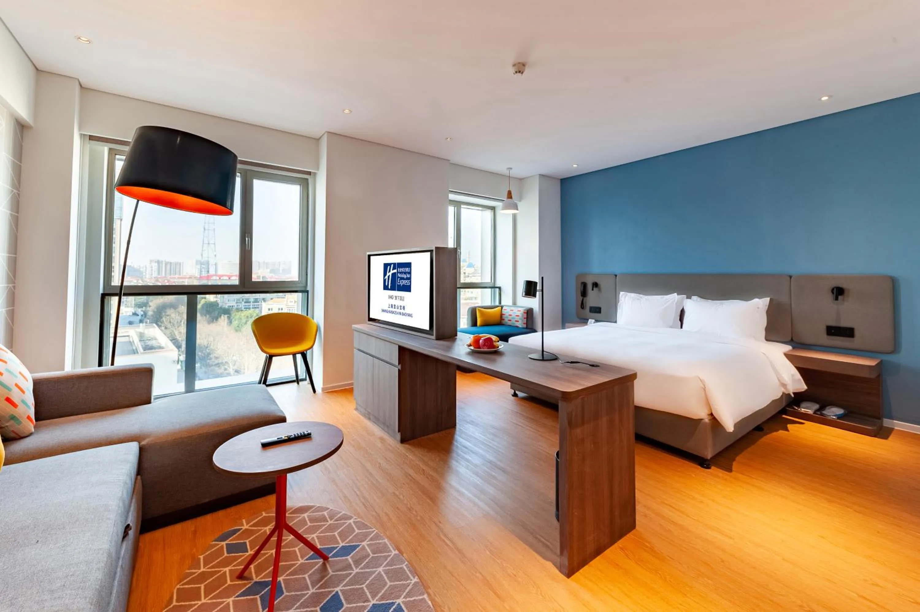 Bed in Holiday Inn Express Shanghai Baoyang by IHG