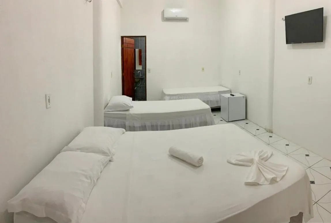 Bed in Pousada Numei de Jeri